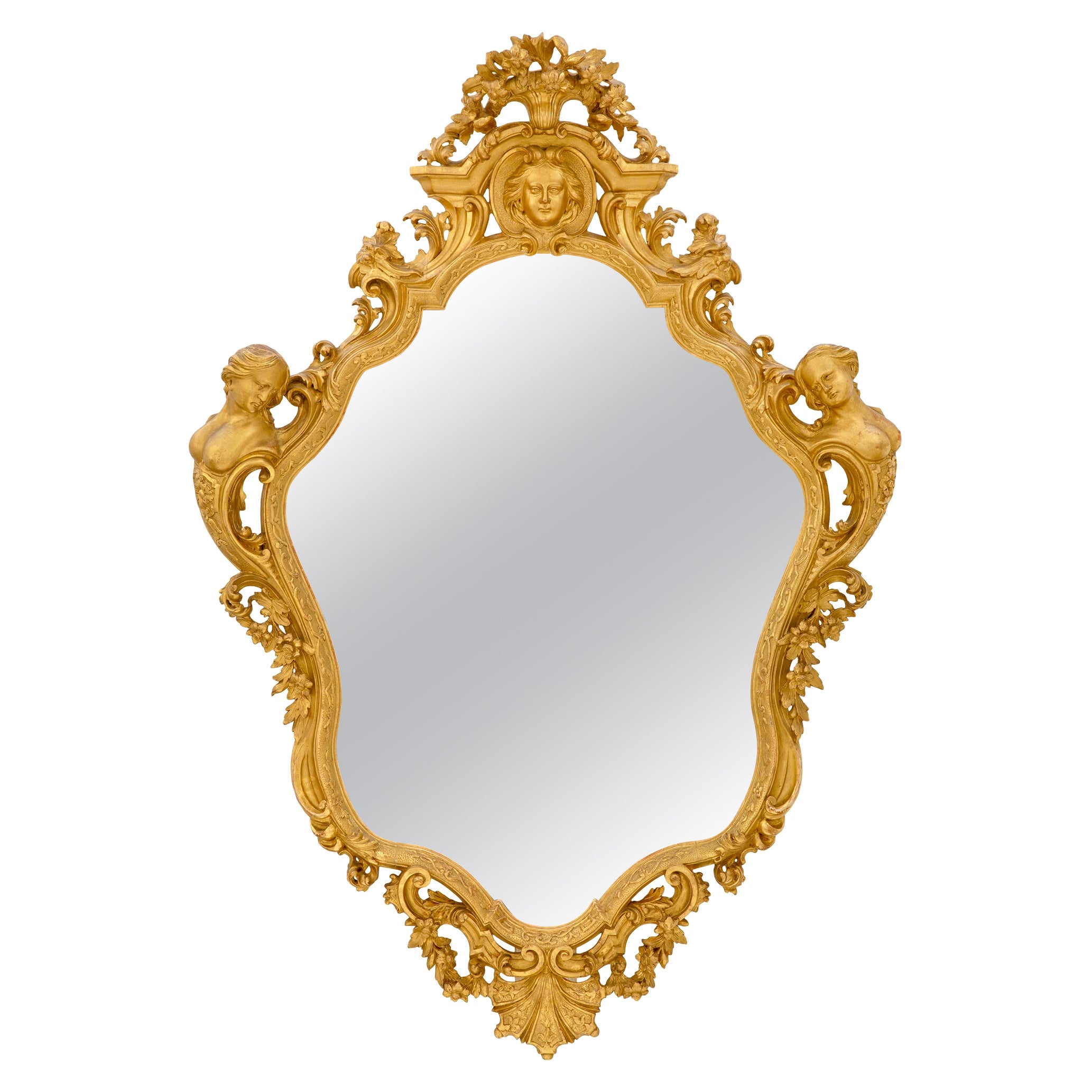 Miroir français du 19ème siècle de style Louis XV en bois doré