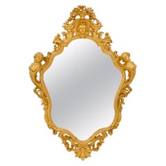 Miroir français du 19ème siècle de style Louis XV en bois doré