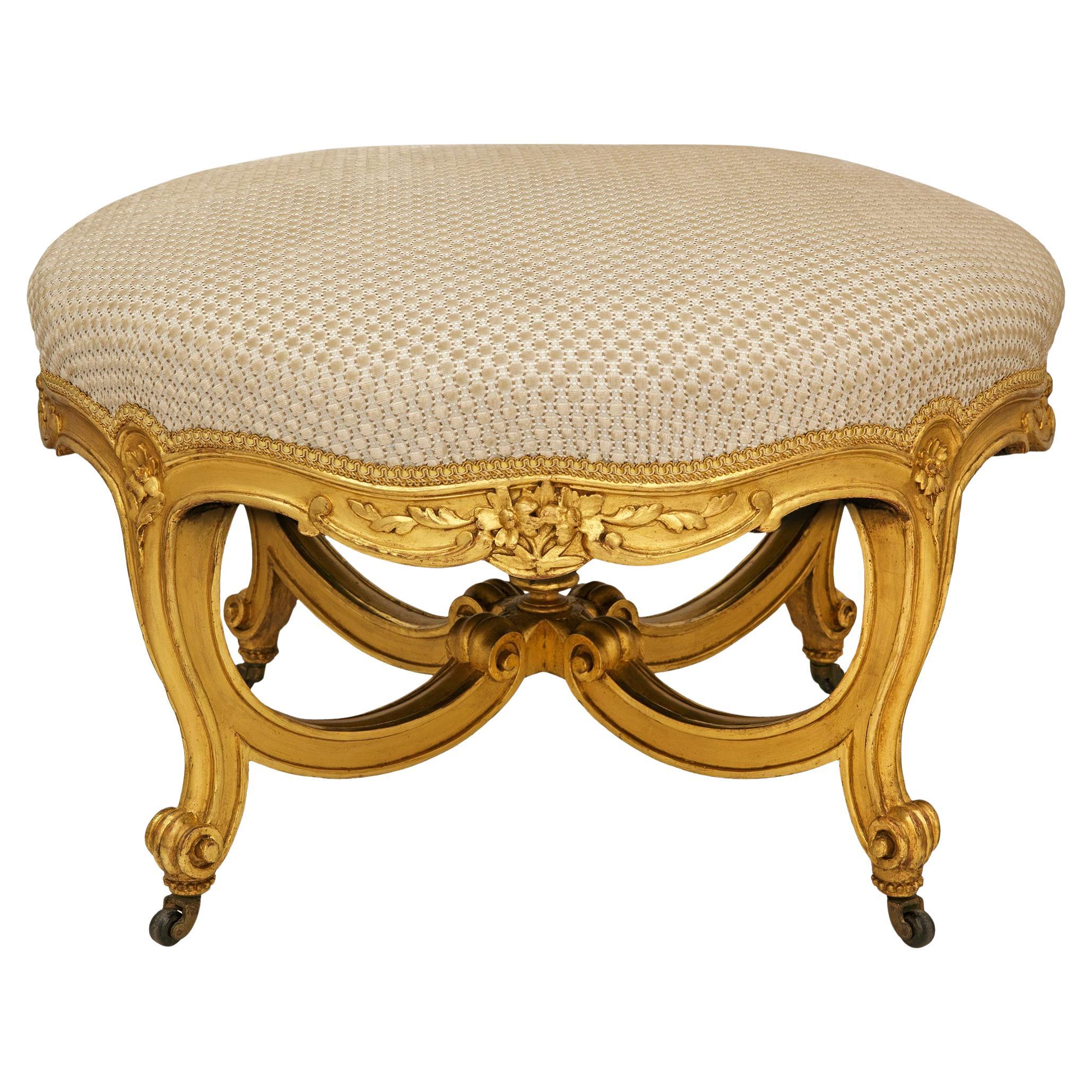 Tabouret en bois doré de style Louis XV du XIXe siècle