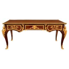 Antique French 19th century Louis XV st. Kingwood and Ormolu desk in the style of Linke