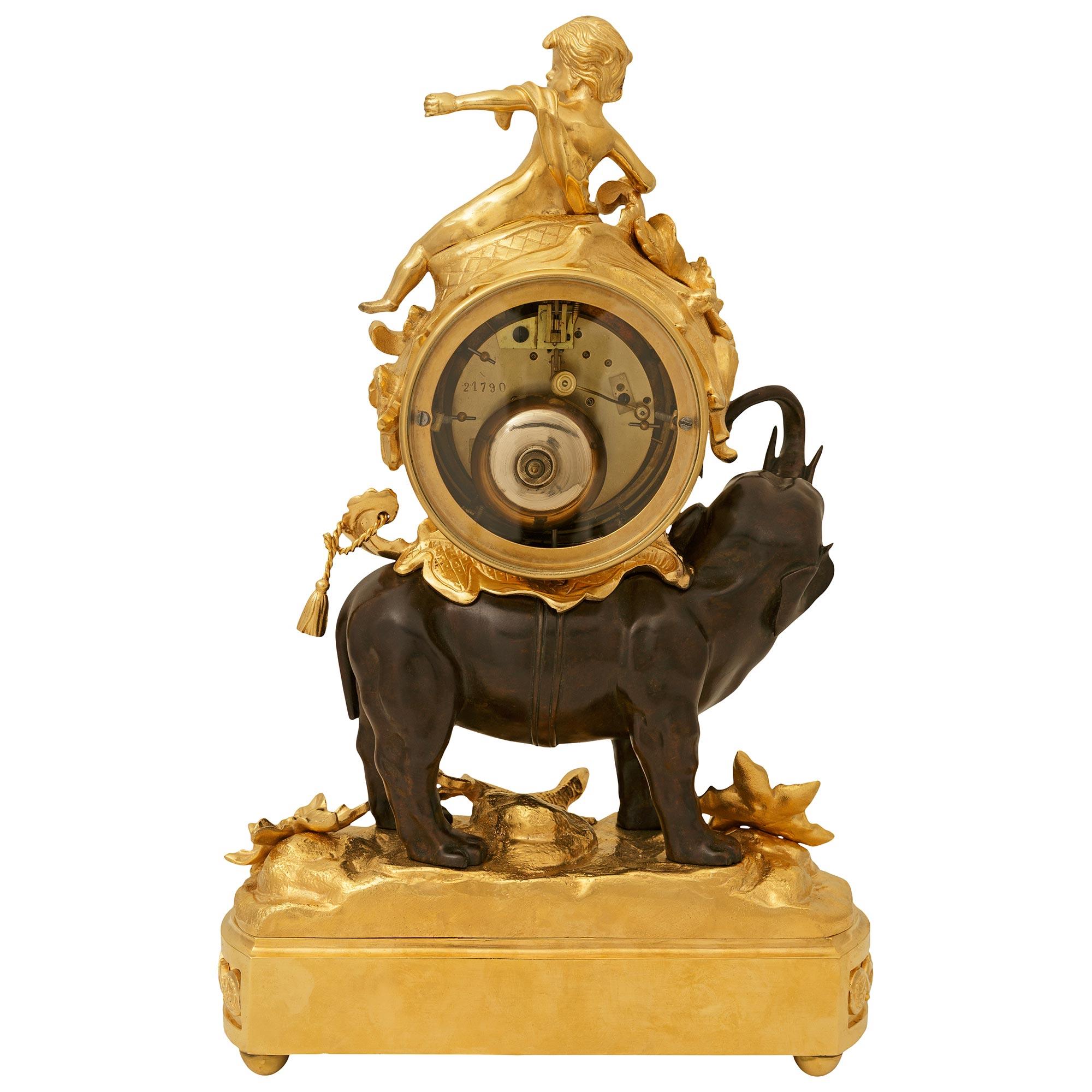 French 19th century Louis XV st. Ormolu and patinated Bronze clock For Sale 7