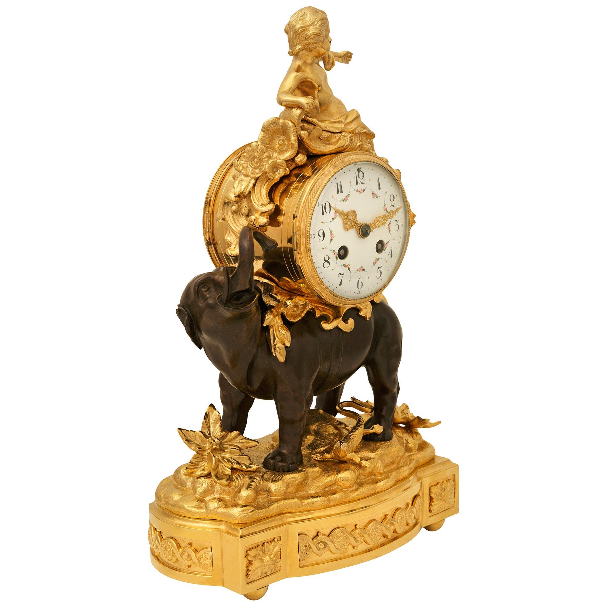 French 19th century Louis XV st. Ormolu and patinated Bronze clock In Good Condition For Sale In West Palm Beach, FL