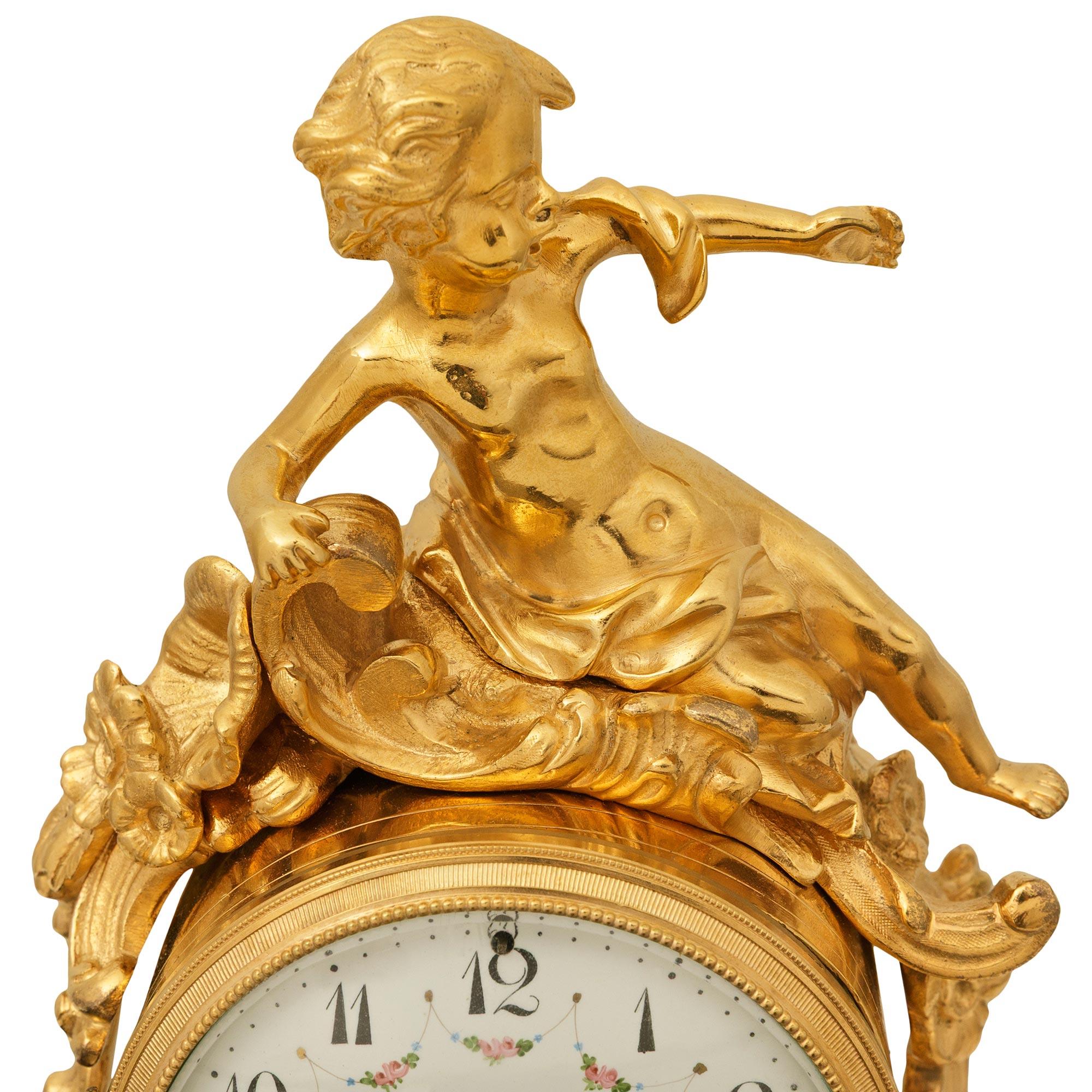 French 19th century Louis XV st. Ormolu and patinated Bronze clock For Sale 1