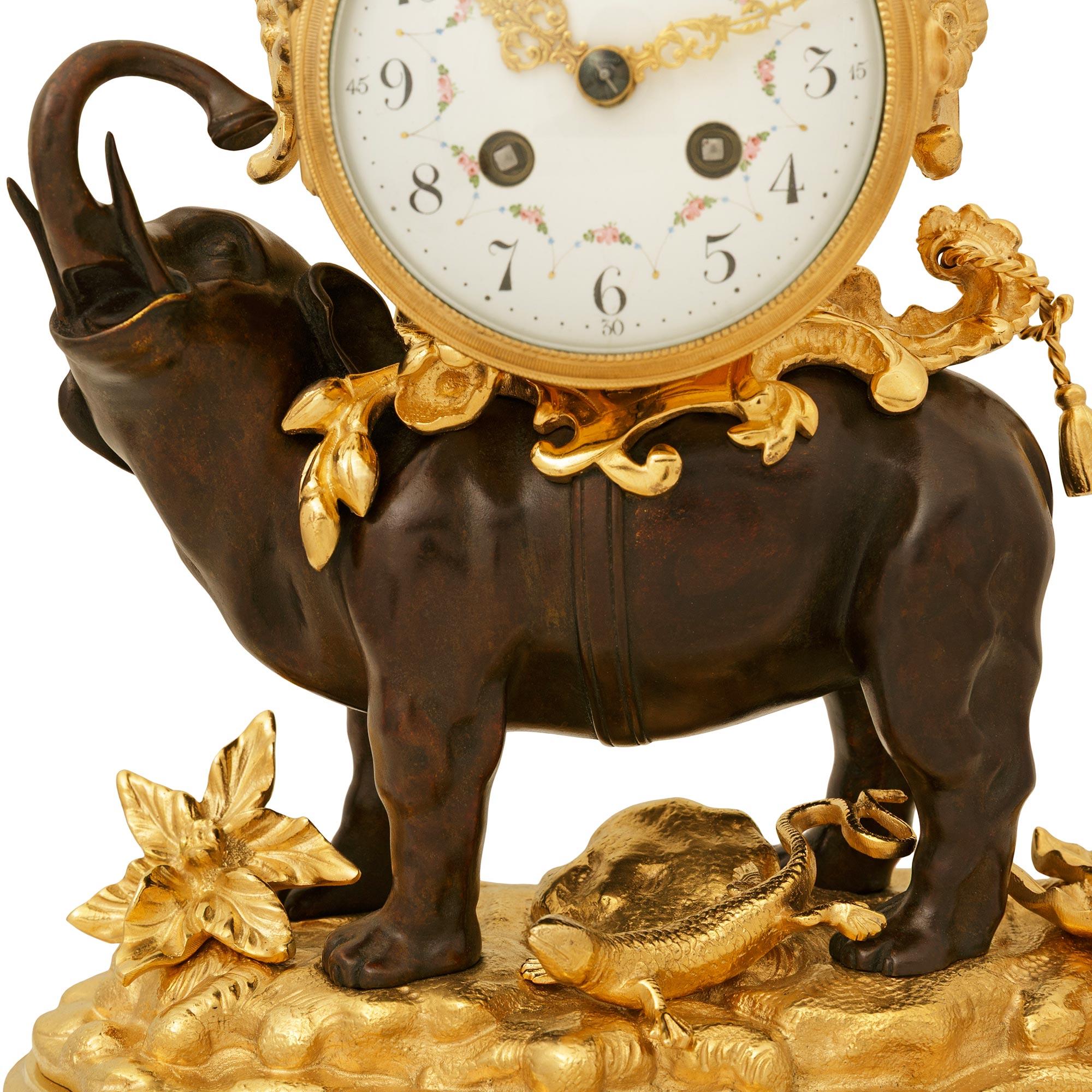 French 19th century Louis XV st. Ormolu and patinated Bronze clock For Sale 3