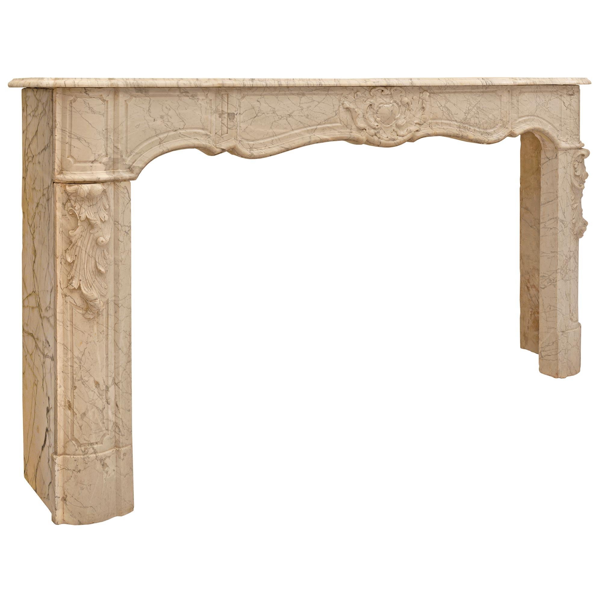 French 19th Century Louis XV St. Sarrancolin Marble Fireplace Mantel In Good Condition For Sale In West Palm Beach, FL