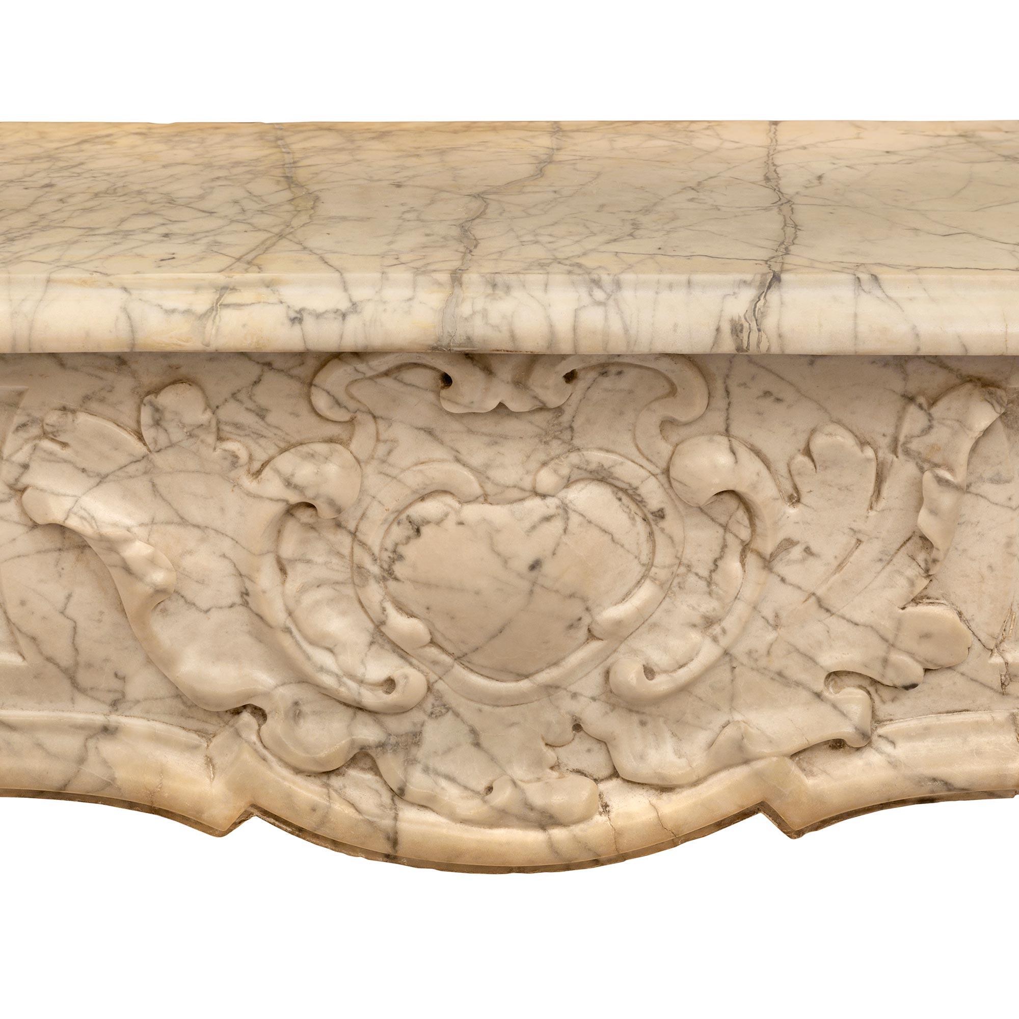 French 19th Century Louis XV St. Sarrancolin Marble Fireplace Mantel For Sale 1