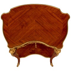 Table d'appoint Louis XV du 19ème siècle en bois de tulipier et bronze doré