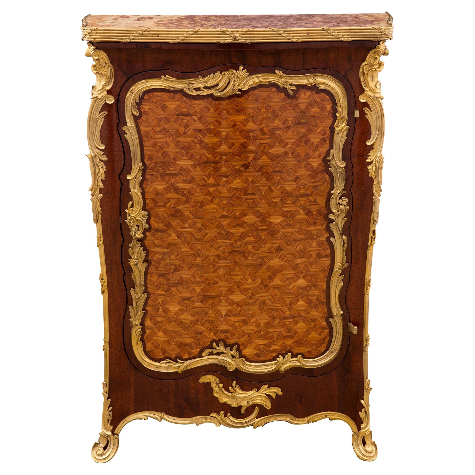 French 19th Century Louis XV St. Tulipwood, Mahogany, Ormolu and Marble Cabinet For Sale