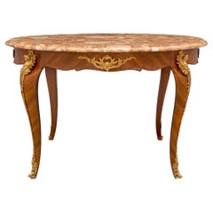French 19th Century Louis XV St. Tulipwood, Ormolu and Marble Center Table