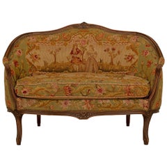 Sillón francés del siglo XIX Luis XV de nogal y tapicería