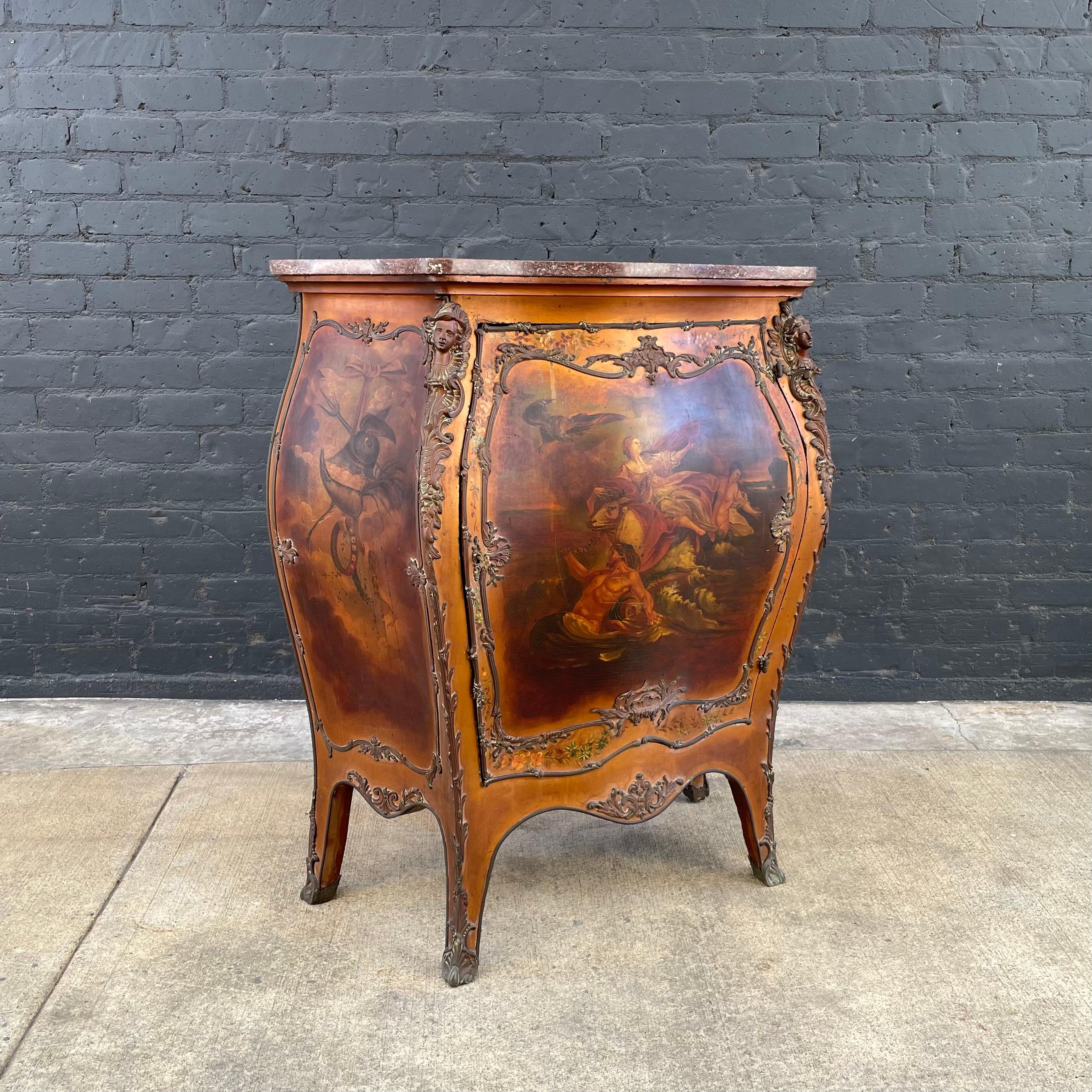 Beautiful, late 19th century French Bombay chest in the Louis XV style.

The chest features superbly hand painted depictions and bronze ormolu decorations. Marble top and original key are included. 

The chest shows age appropriate patina and