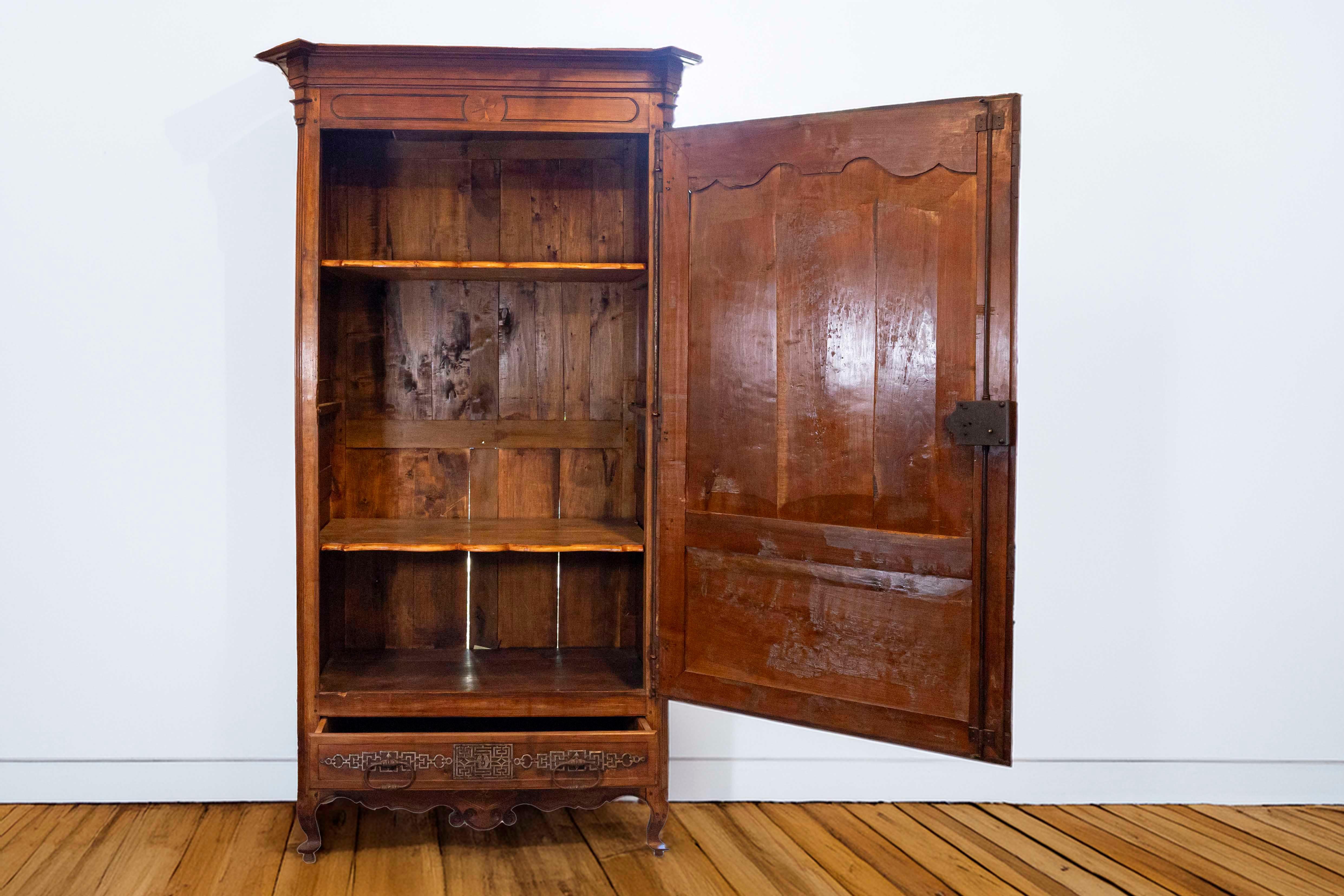 French 19th Century Louis XV Style Cherry Bonnetière with Intricate Hardware In Good Condition In Atlanta, GA