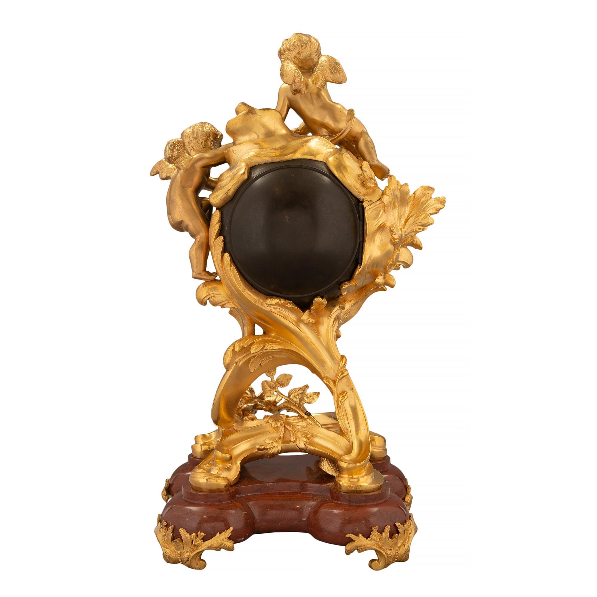 French 19th Century Louis XV Style Ormolu Bronze and Rouge Griotte Marble Clock For Sale 1