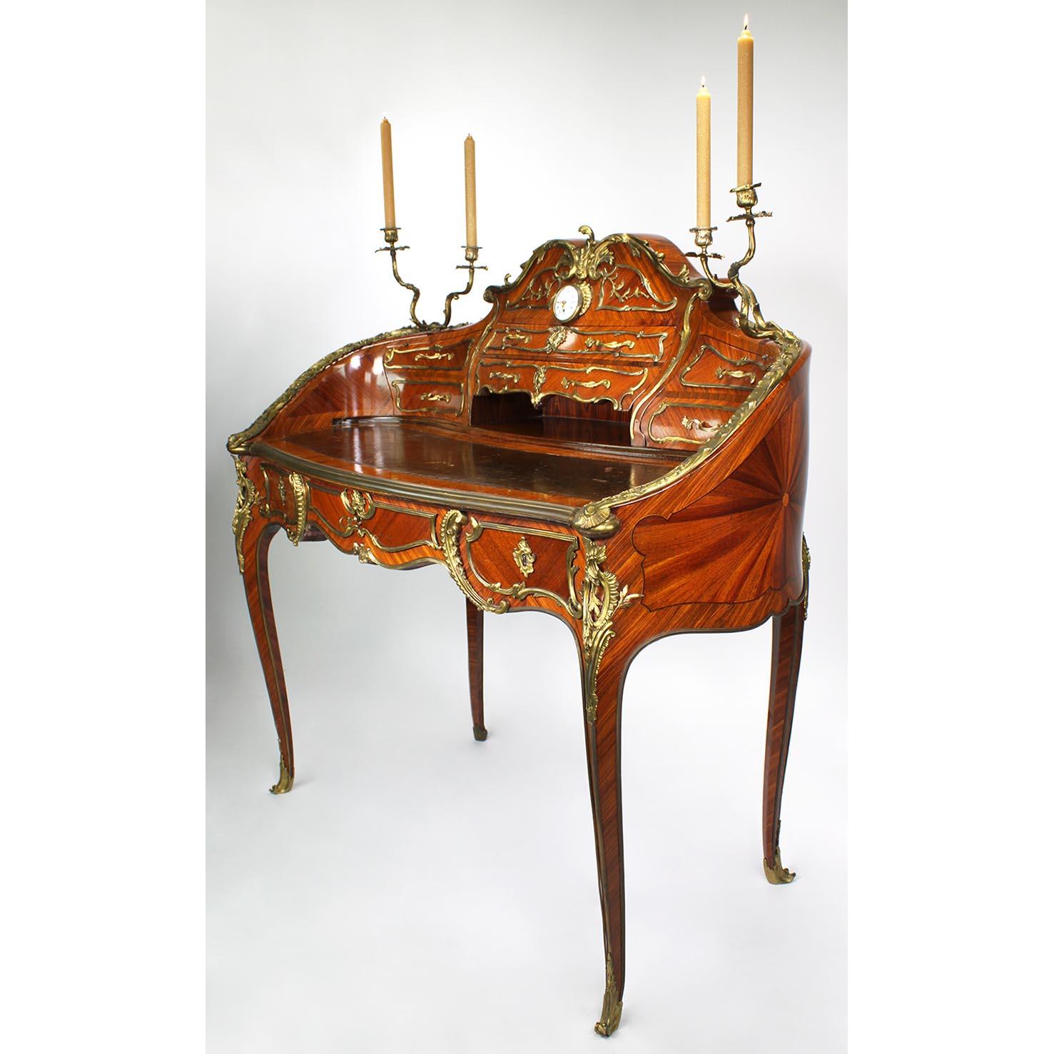 A Very fine French 19th century Louis XV Style Ormolu-Mounted Kingwood, Satinwood and Fruitwood Parquetry Kidney-Shaped secrétaire de dame (Lady's Desk) with an enamel dial clock and Candelabra, Attributed to Théodore Millet 
