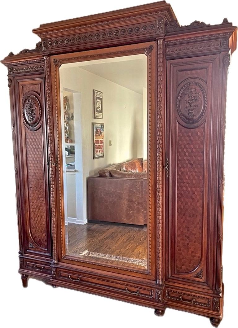 Hand-Carved French 1950s Louis XV Style Stained Hand Carved Cherrywood Armoire For Sale