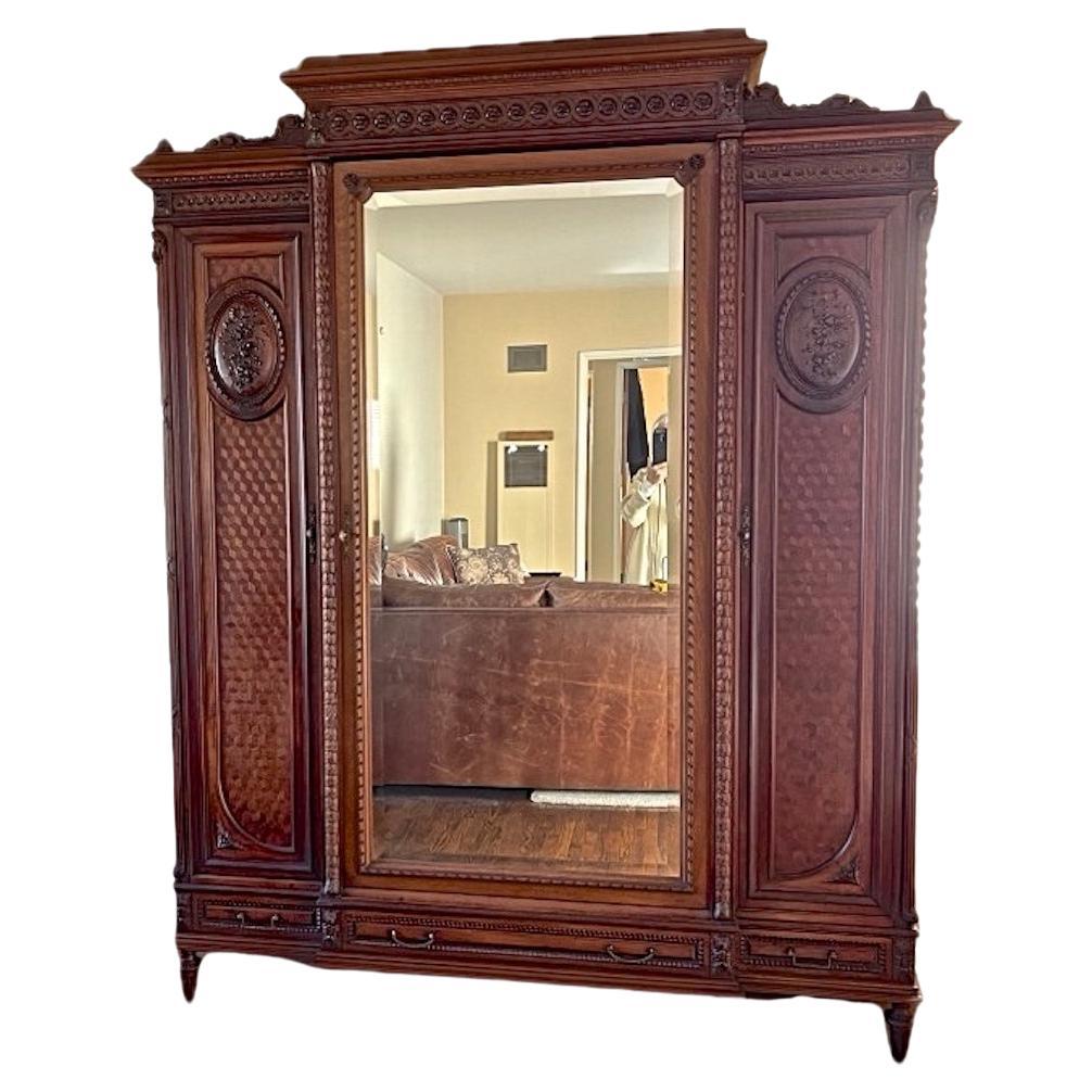 French 1950s Louis XV Style Stained Hand Carved Cherrywood Armoire For Sale