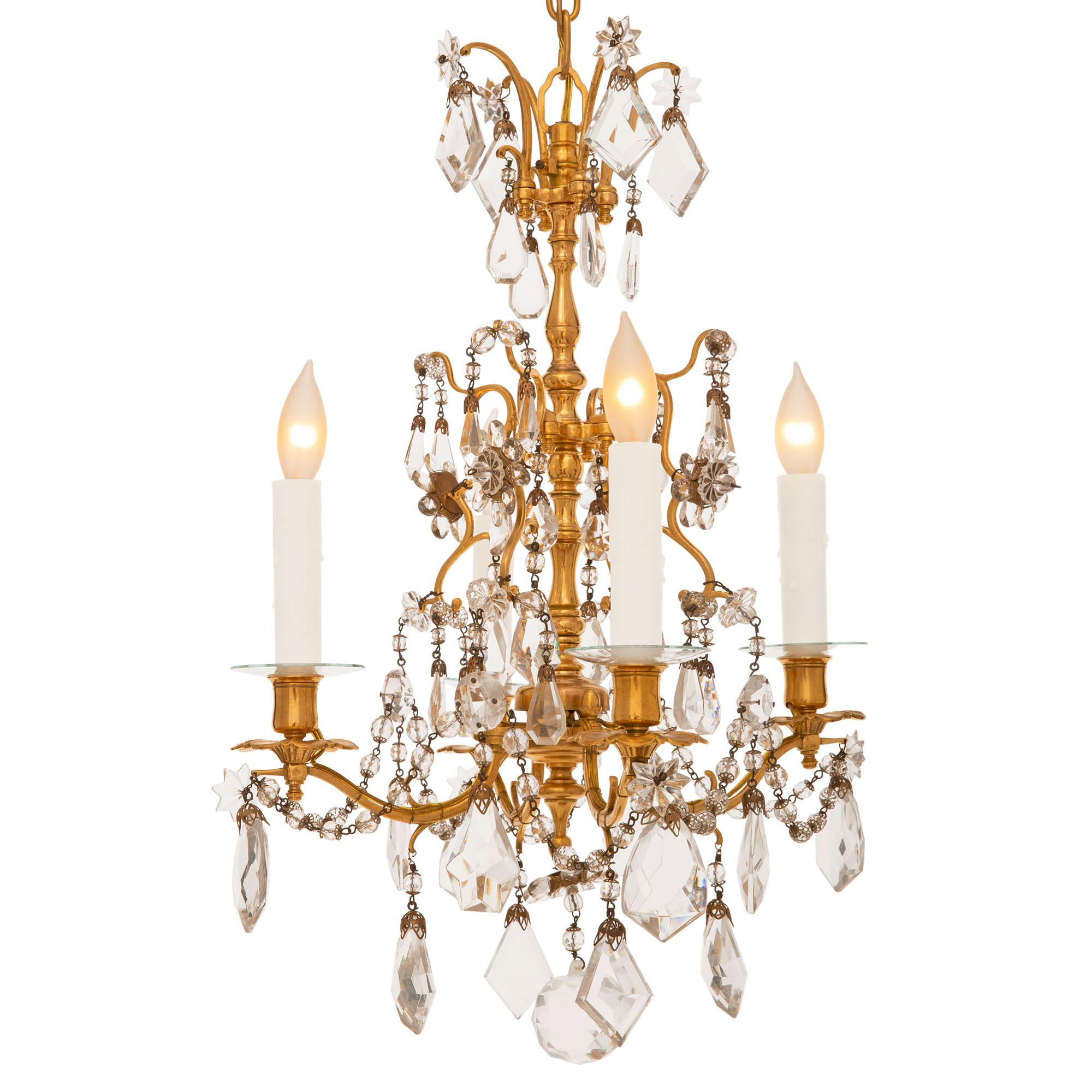 French 19th Century Louis XV/XVI St. Ormolu And Crystal Chandelier In Good Condition In West Palm Beach, FL