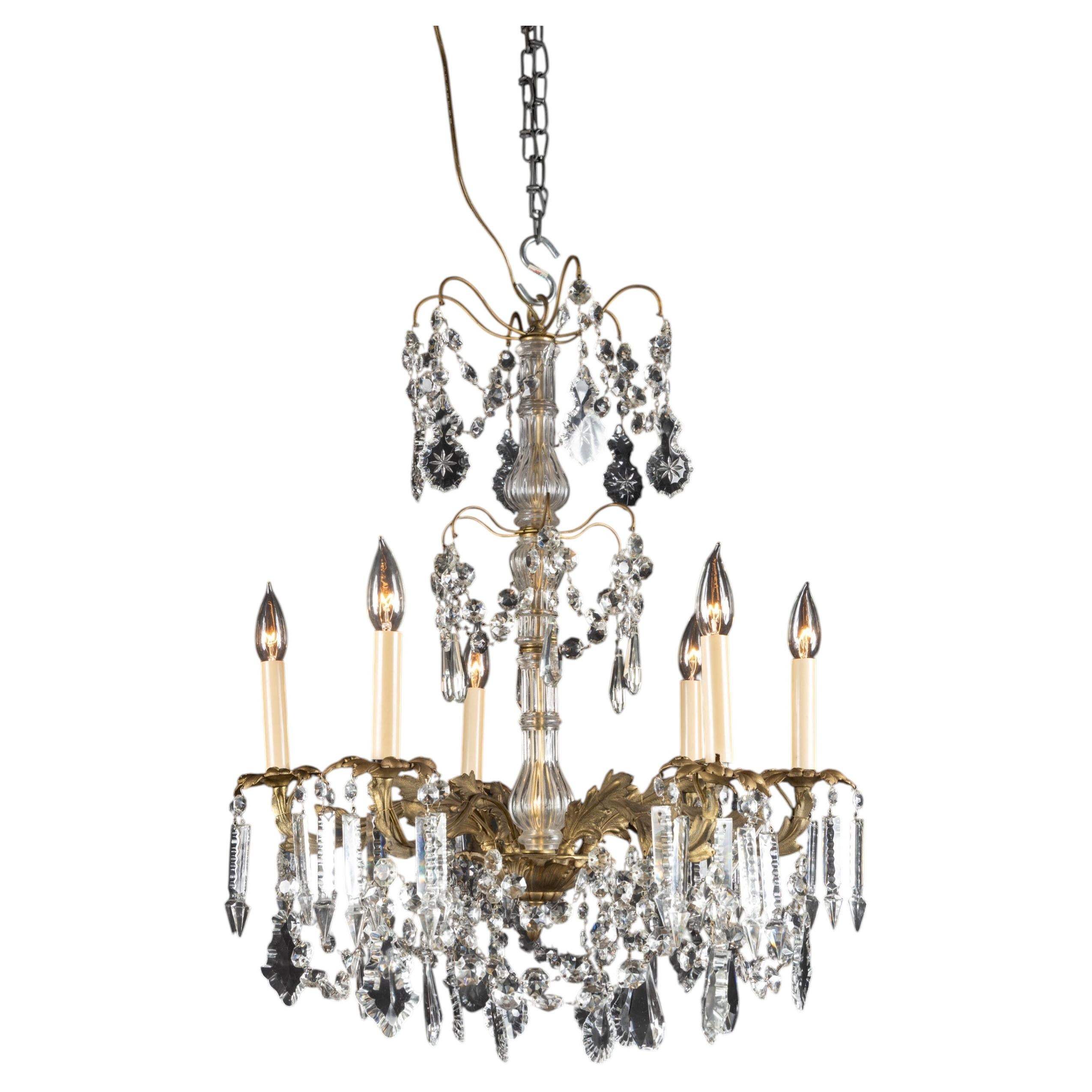 Lustre Louis XVI en bronze et cristal du 19ème siècle en vente
