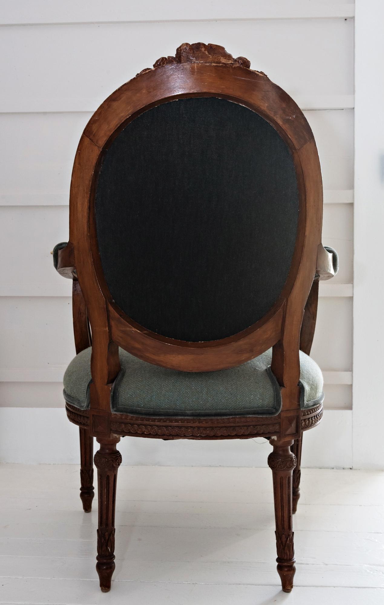 19th century carved walnut Louis XVI side chair covered in Ralph Lauren teal Mohair with contrasting teal tweed on back medallion of chair. Lovely French bow, scroll detail and flowers.
Note: see also matching....
French, 19th century Louis XVI
