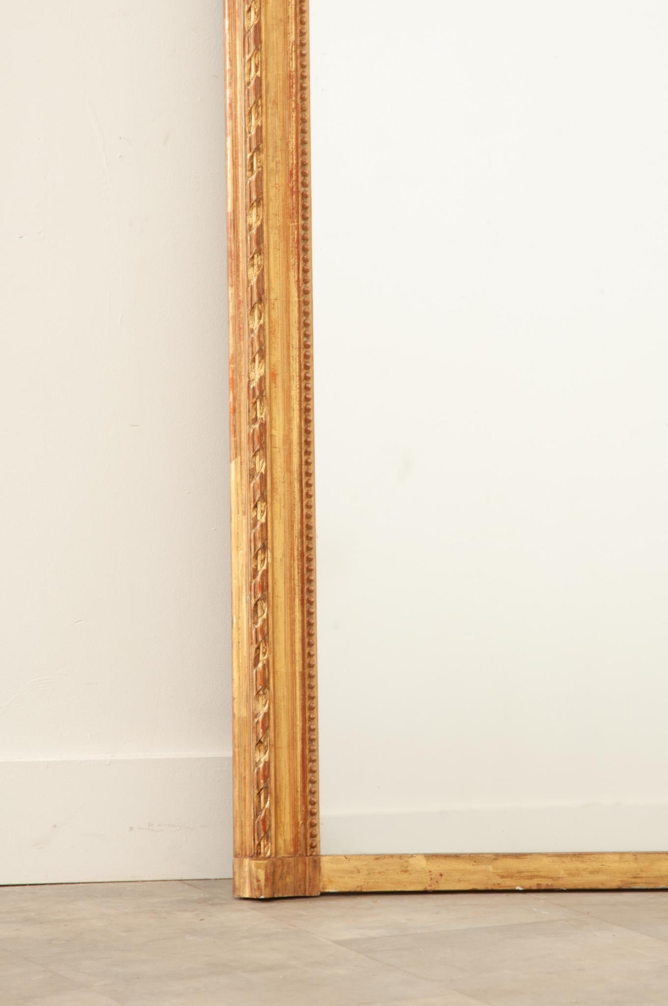 Hand-Carved French 19th Century Louis XVI Gilt Mantel Mirror For Sale