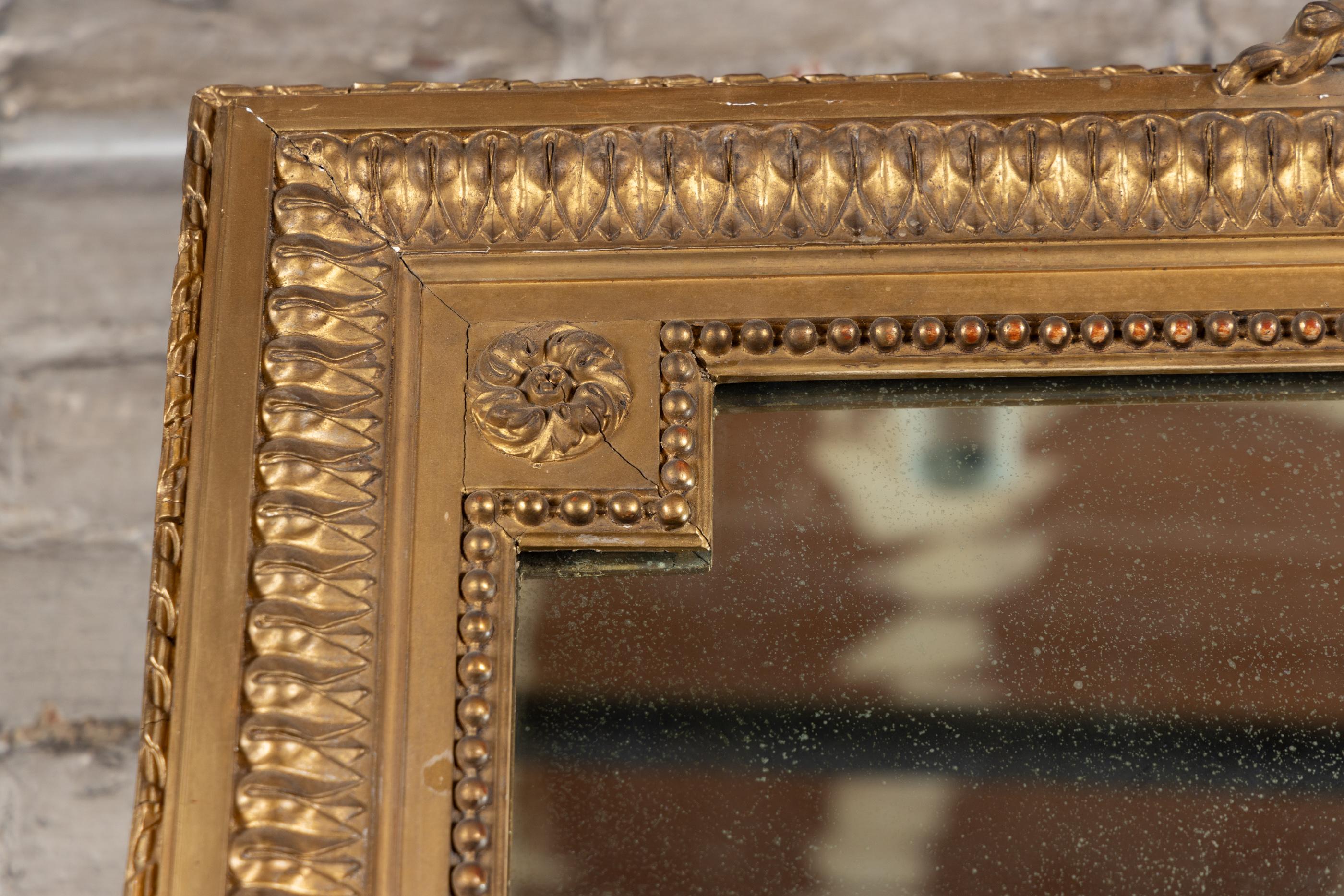 XIXe siècle Miroir à feuilles d'or Louis XVI du 19ème siècle à décor de feuillages en vente