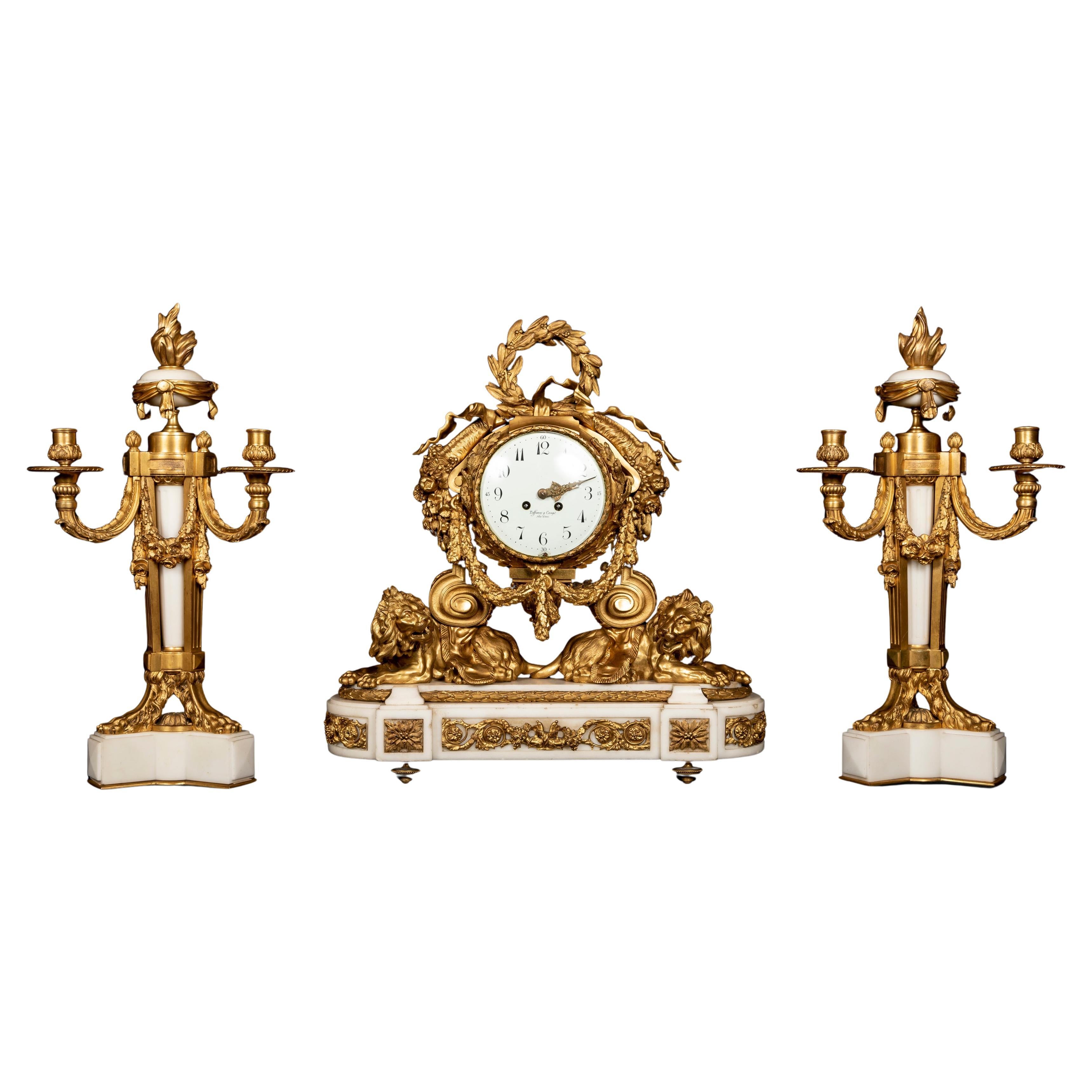 Ensemble de pendules en bronze doré et marbre Louis XVI du 19ème siècle, vendu par Tiffany & Co. en vente