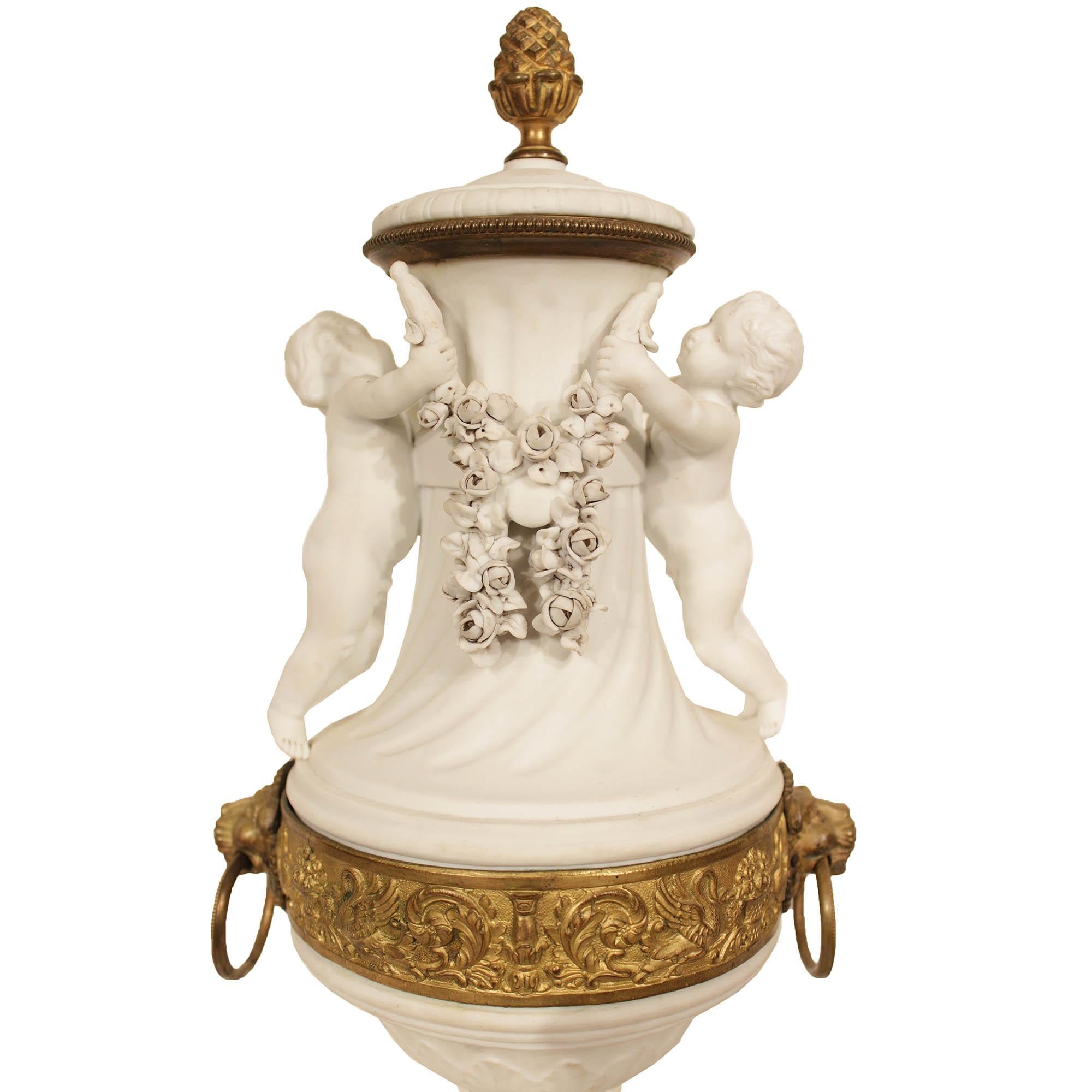 Porcelain French 19th Century Louis XVI St. Biscuit De Sèvres Garniture Clock Set For Sale