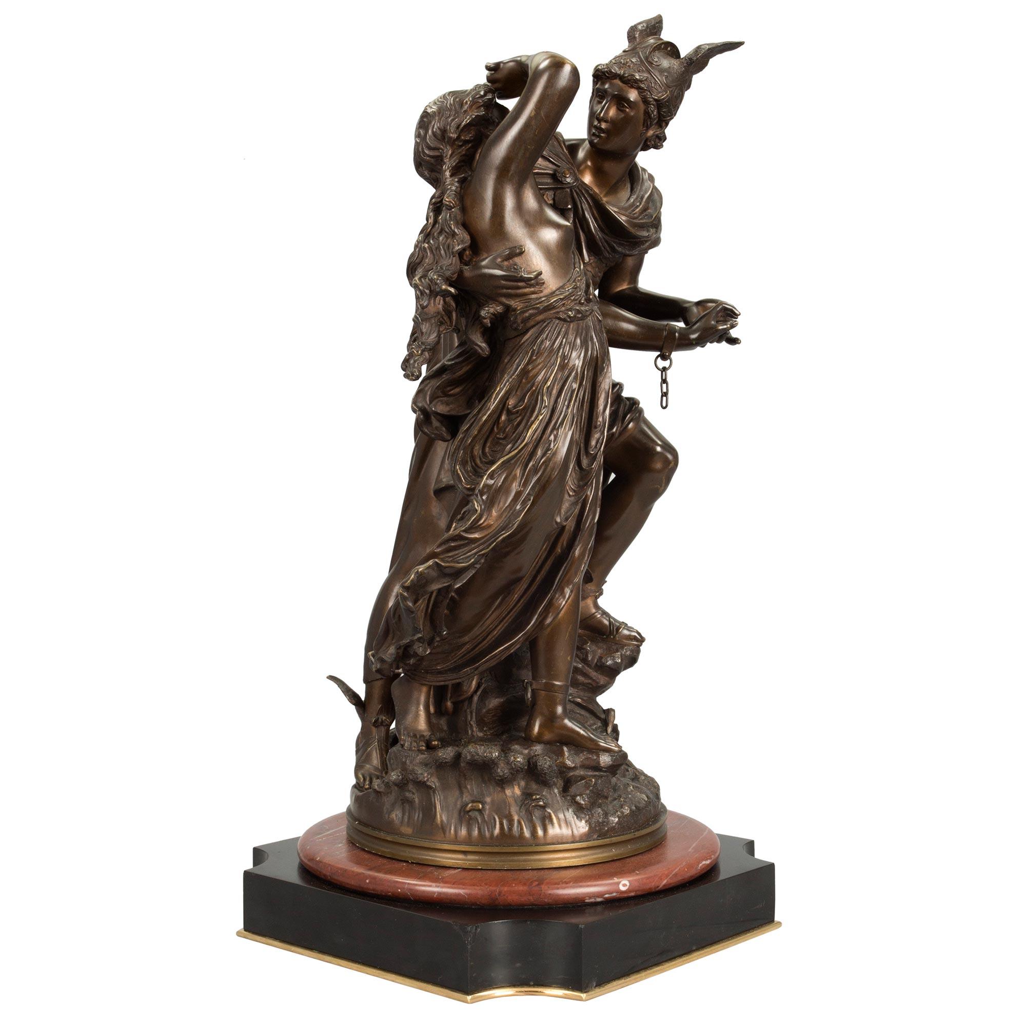 A beautiful and high quality French 19th century Louis XVI st. patinated bronze of the Rescue of Andromeda signed L. Gregoire. This striking bronze portrays Perseus, who was provided with the winged sandals of Hermes so that he could fly and the