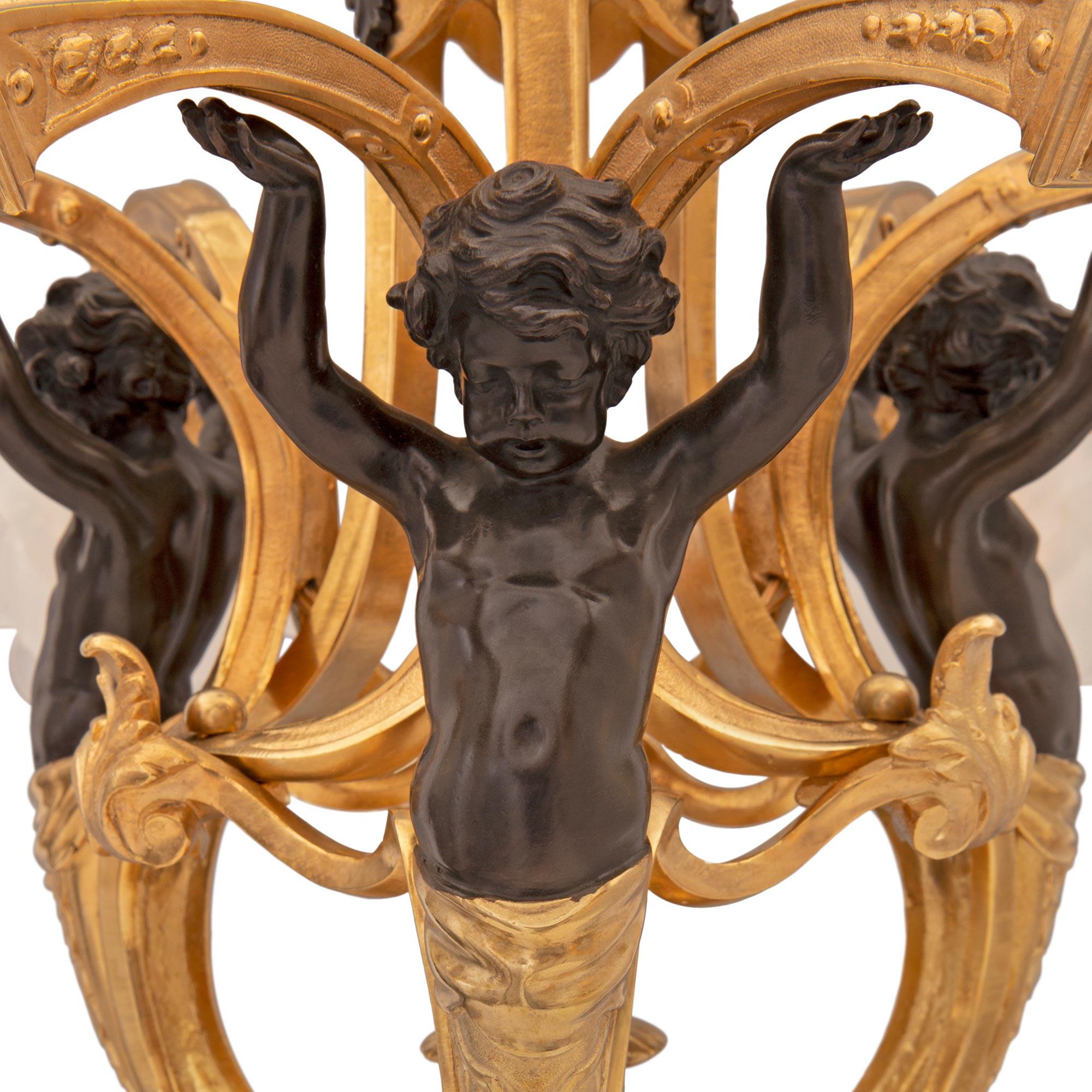 French 19th Century Louis XVI St. Bronze, Ormolu and Frosted Glass Chandelier For Sale 1