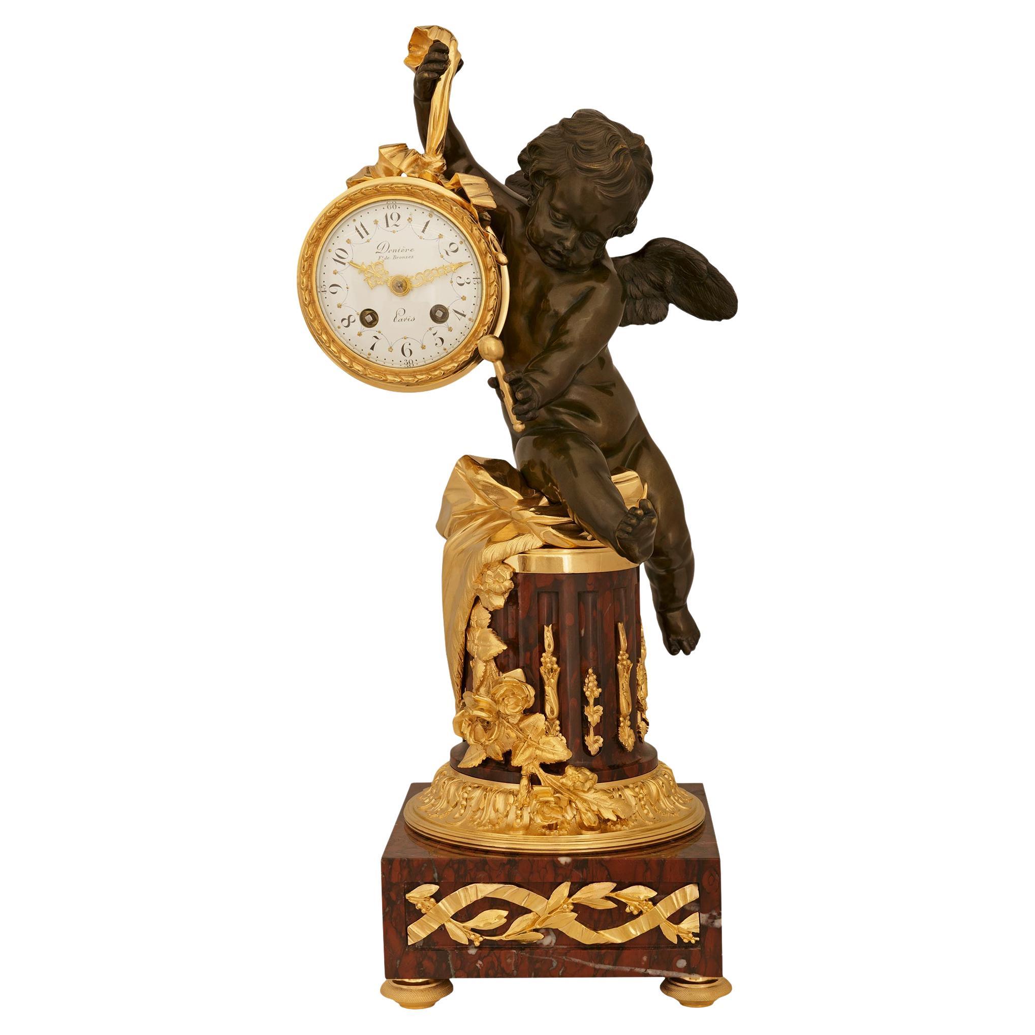 French 19th century Louis XVI st. Bronze, Ormolu and Marble Clock, by Denière