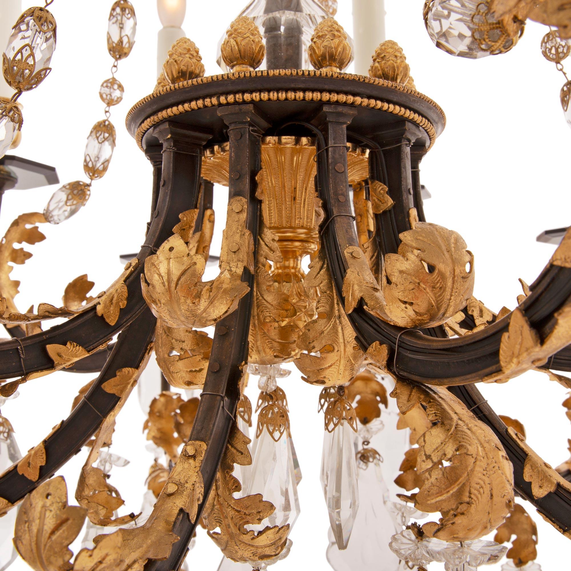 French 19th Century Louis XVI St. Crystal, Ormolu, and Wrought Iron Chandelier In Good Condition For Sale In West Palm Beach, FL