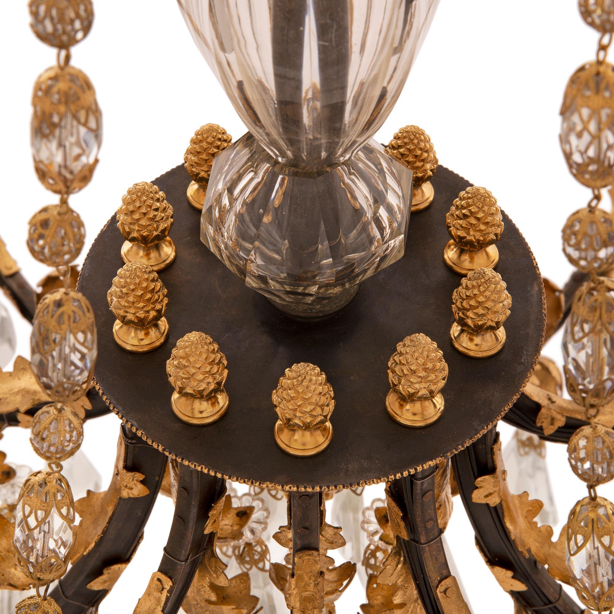 Metal French 19th Century Louis XVI St. Crystal, Ormolu, and Wrought Iron Chandelier For Sale