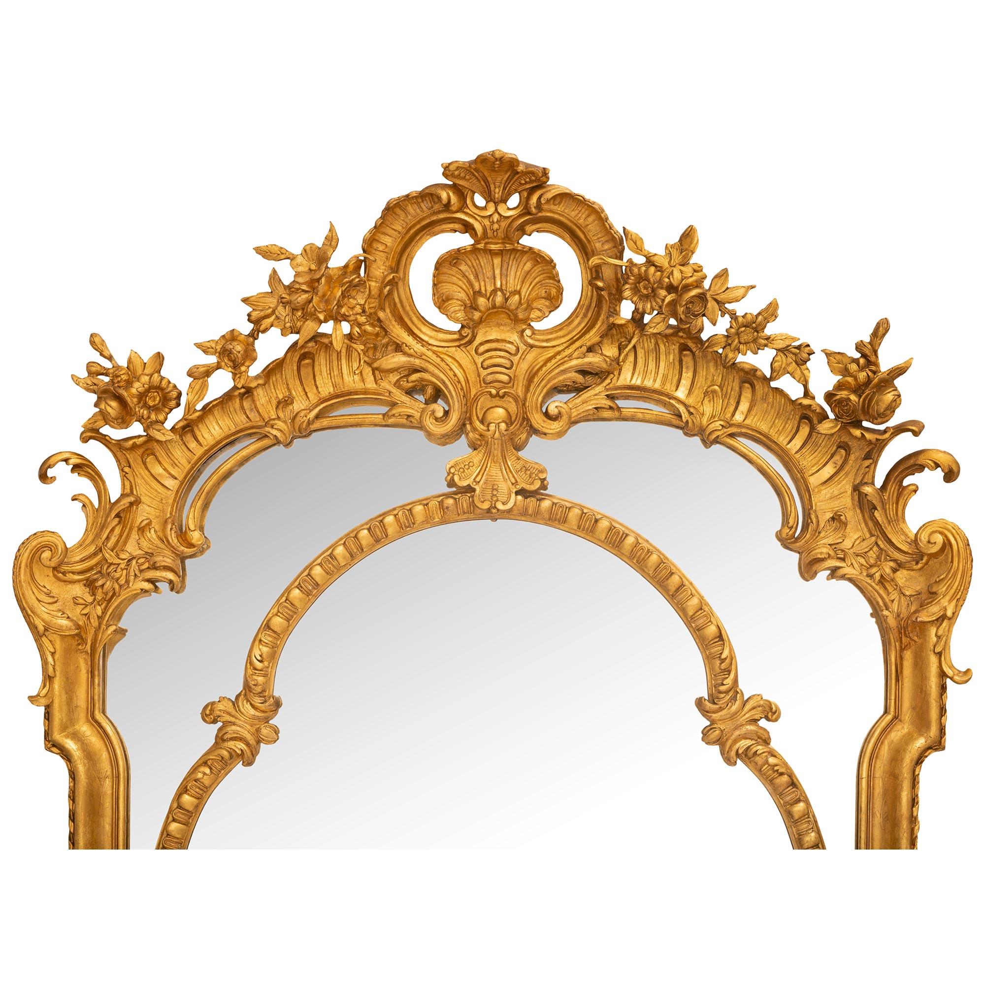 A striking and most impressive French 19th century Louis XVI st. double framed giltwood mirror. The mirror retains all of its original mirror plates throughout with the central plate framed within a lovely most decorative scalloped Les Oves designs
