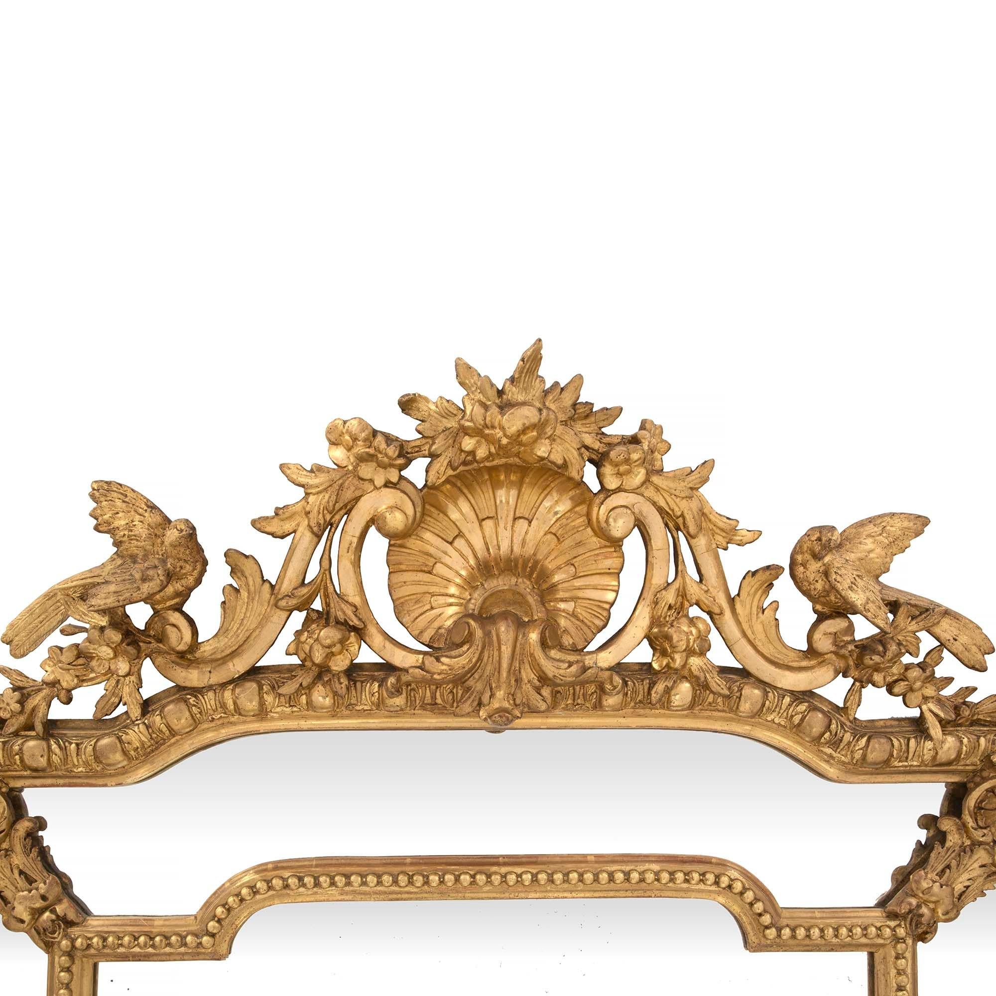 Français Miroir français du XIXe siècle en bois doré à double cadre de style Louis XVI du XIXe siècle en vente