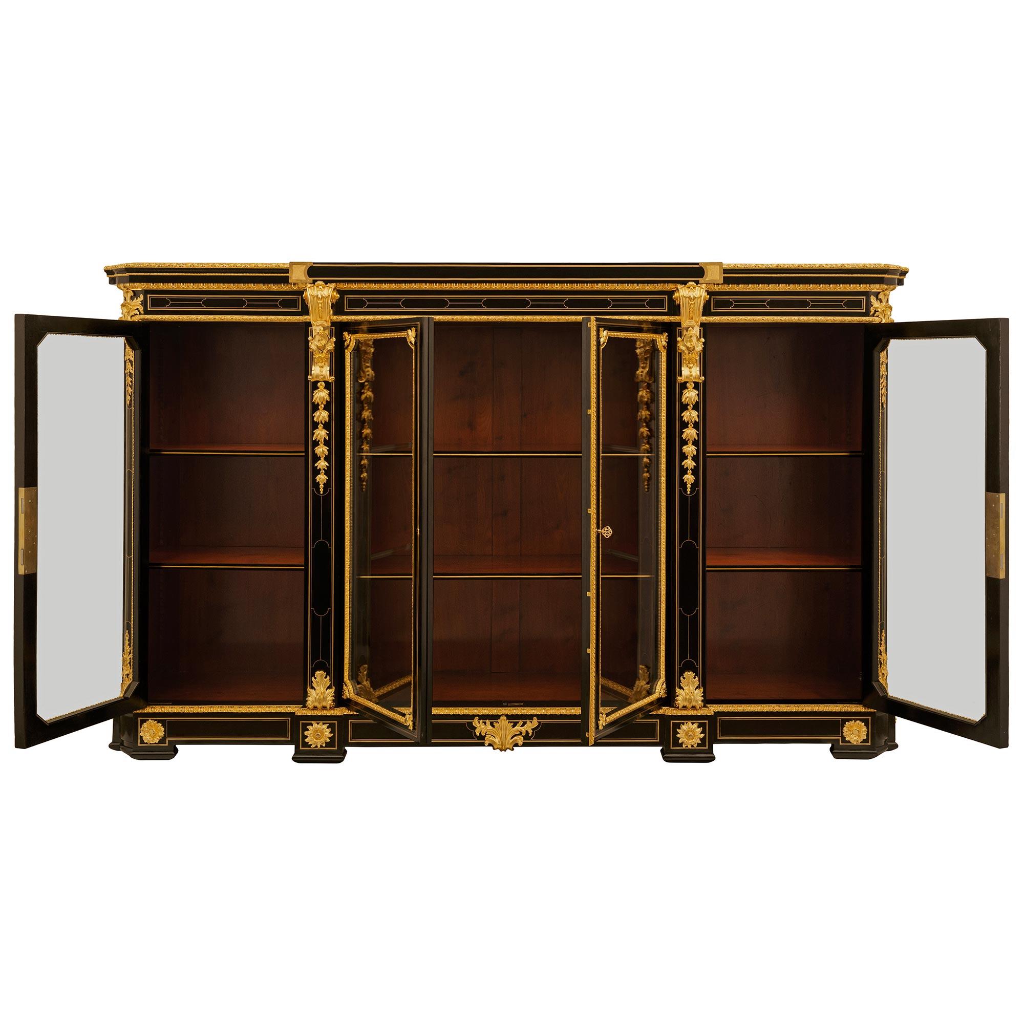 French 19th century Louis XVI st. Ebony and Ormolu Boulle vitrine In Good Condition For Sale In West Palm Beach, FL