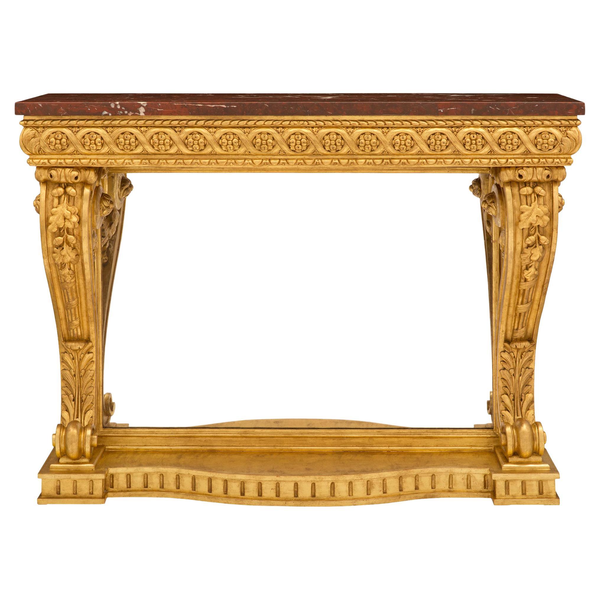 Console en bois doré et marbre rouge griotte de style Louis XVI du 19e siècle