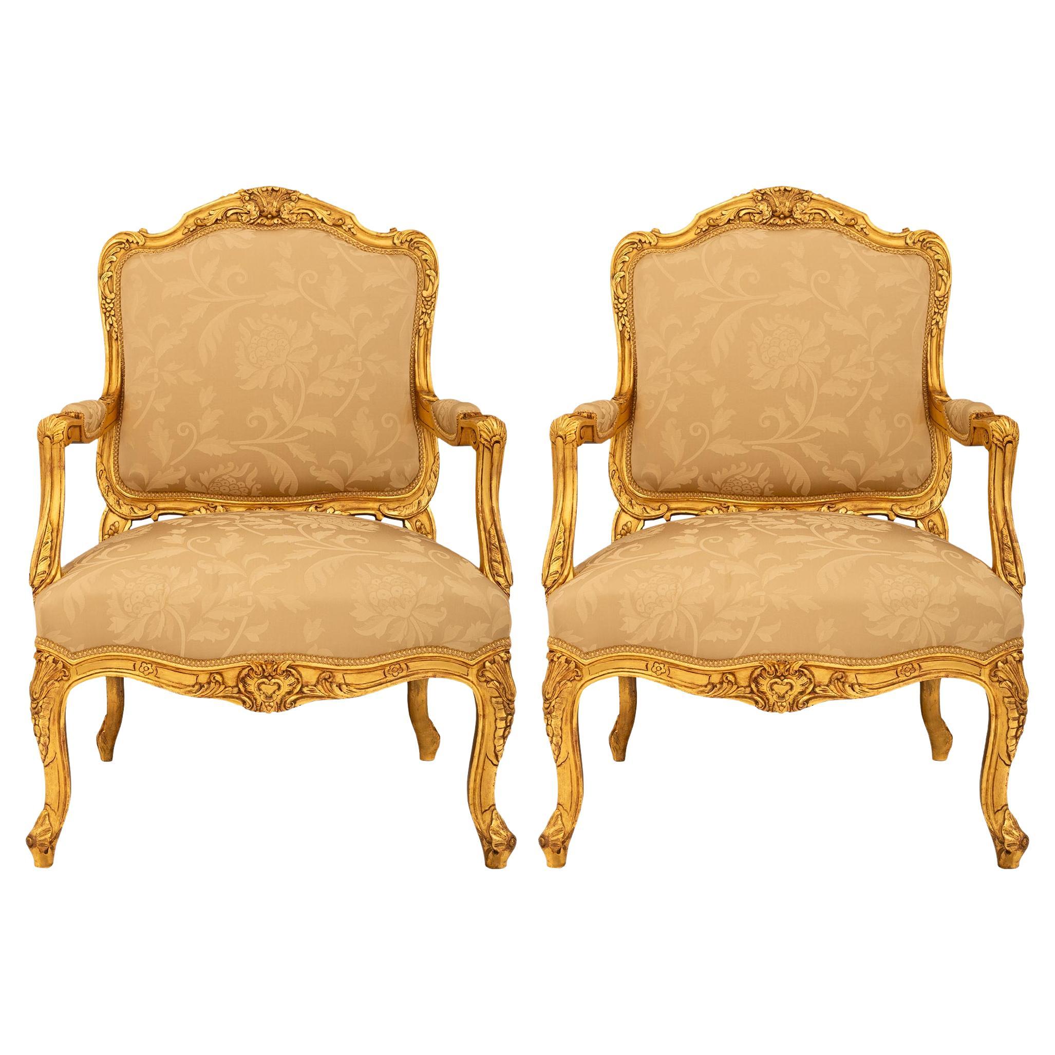 French 19th century Louis XV st. Giltwood armchairs