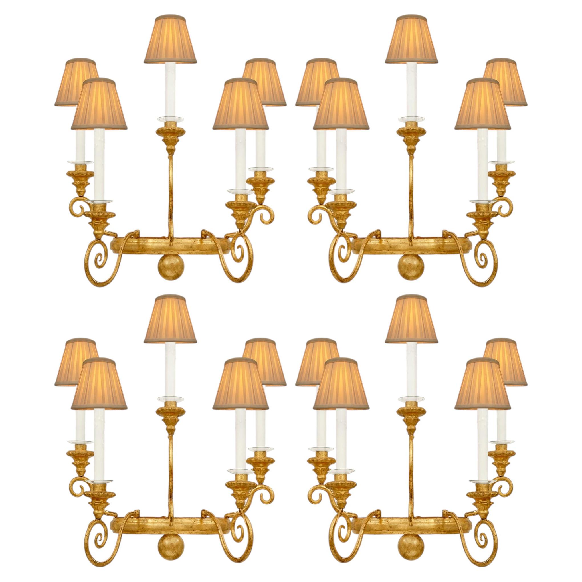 set of four Italian 18th century Baroque st. Giltwood and Gilt Metal sconces