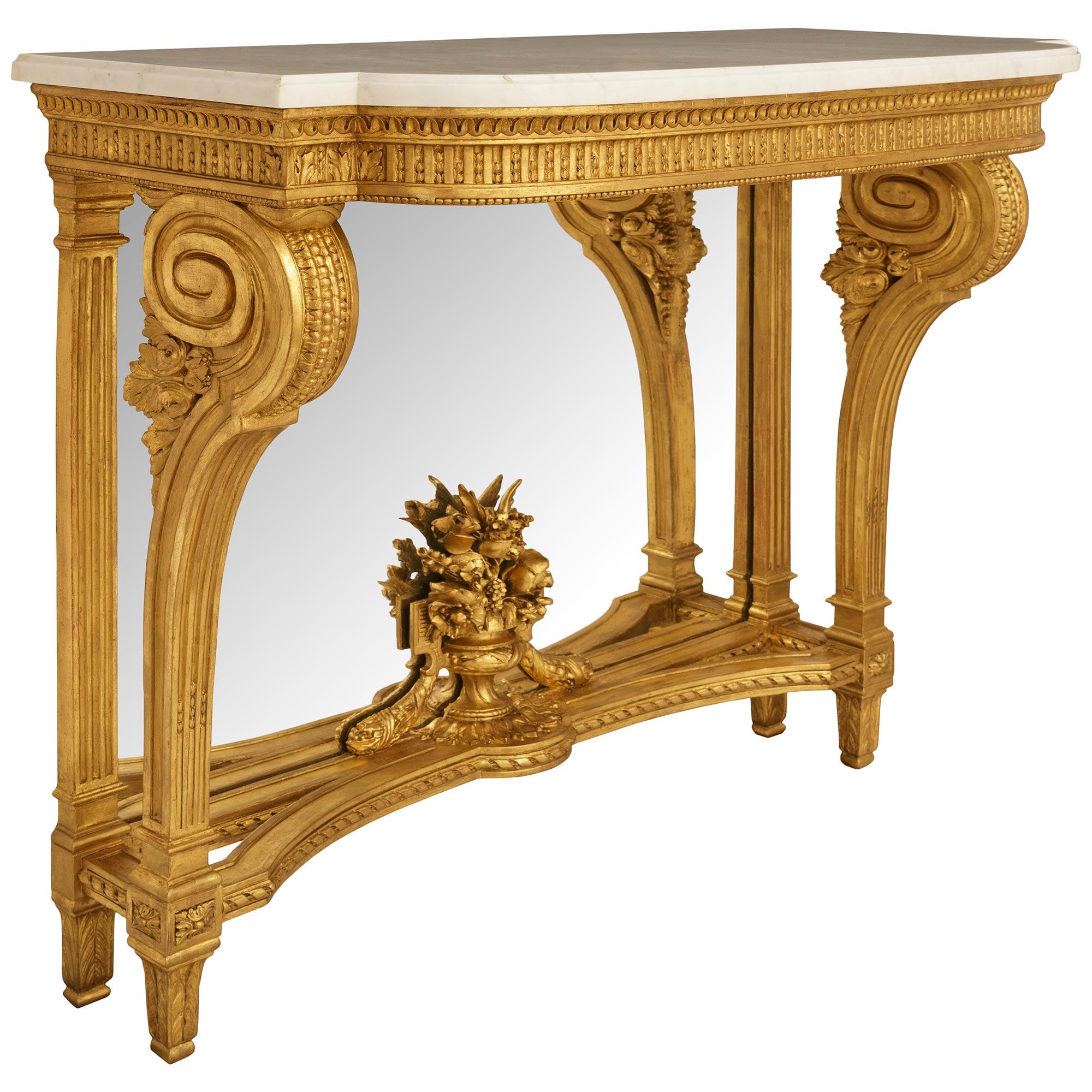 French 19th century Louis XVI st. Giltwood, Mirror and Carrara marble console Luis XVI en venta