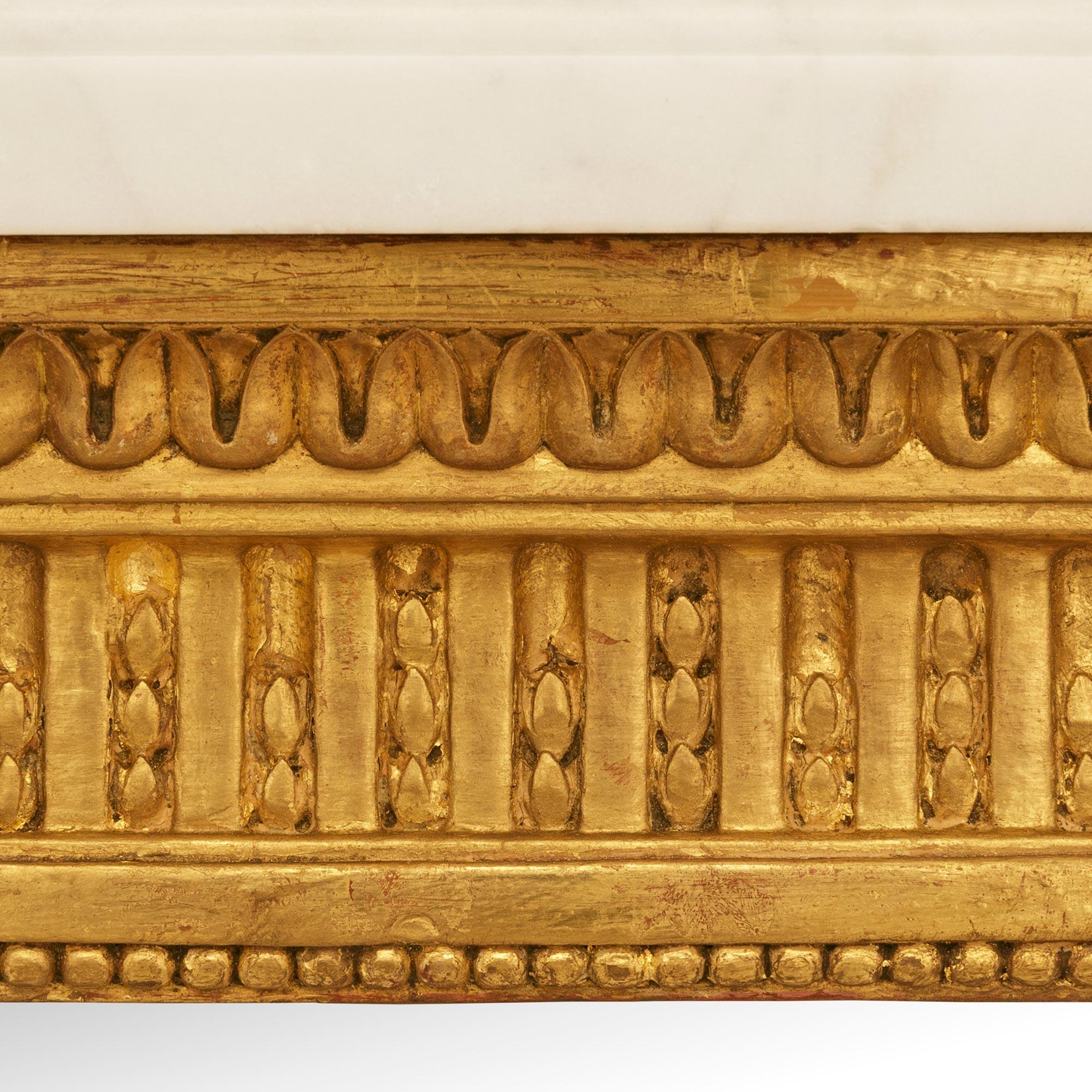 French 19th century Louis XVI st. Giltwood, Mirror and Carrara marble console siglo XIX en venta