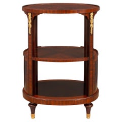 Table d'appoint en bois de roi et bronze doré, de style Louis XVI, du 19e siècle.