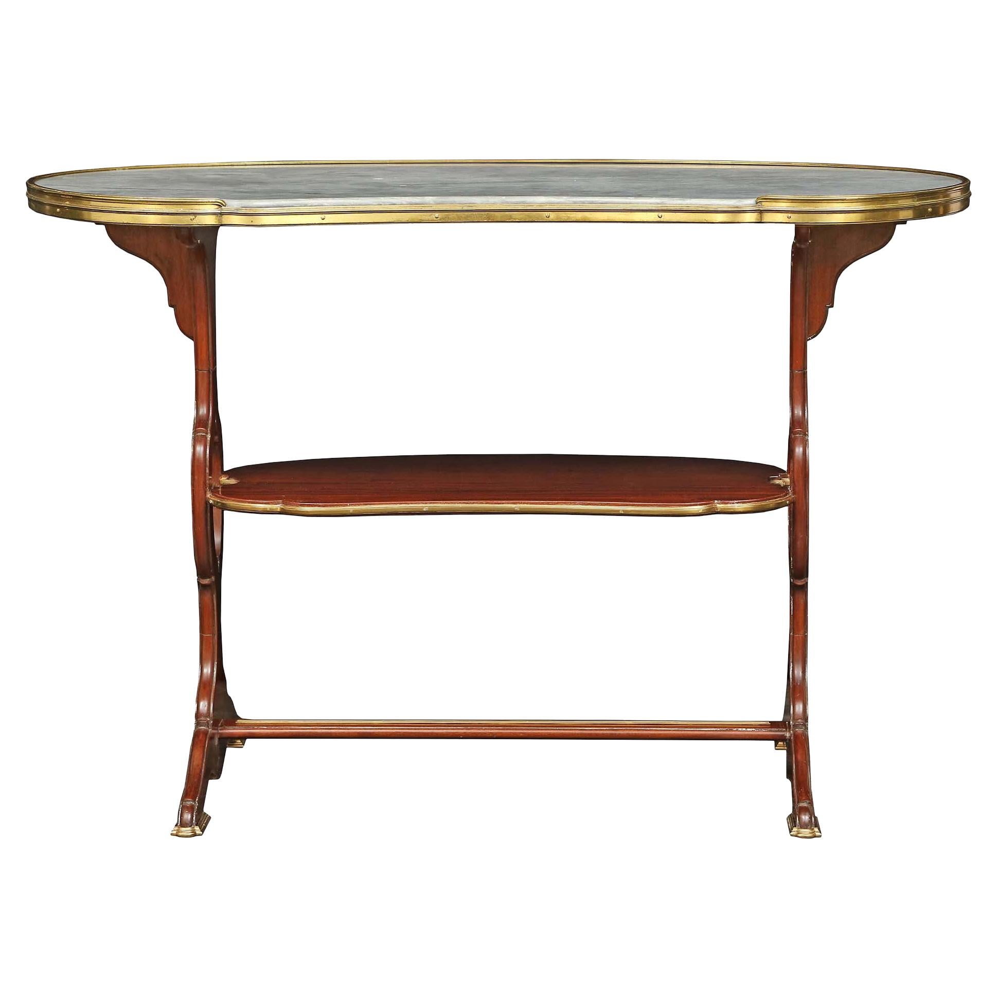 Mesa auxiliar francesa en forma de riñón de caoba y ormolina del siglo XIX, estilo Luis XVI