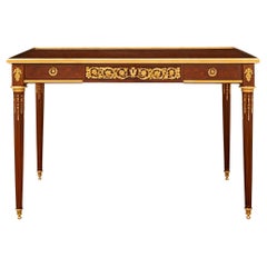 Used French 19th century Louis XVI st. Mahogany, Kingwood and Ormolu table/desk