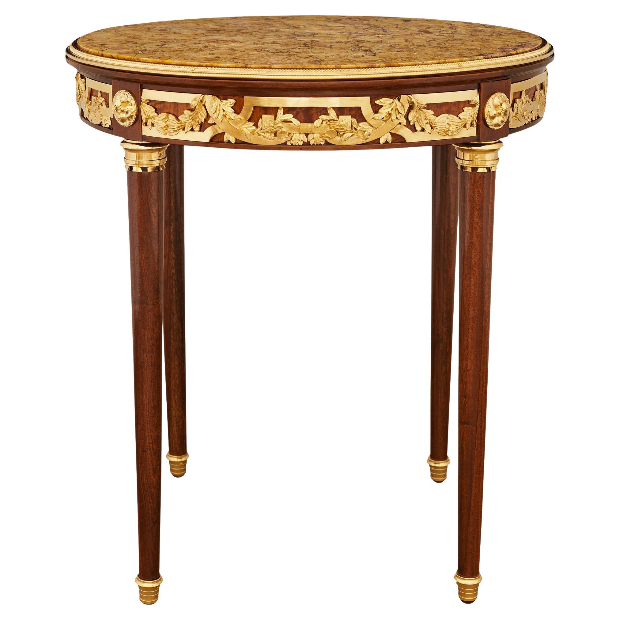 Table en acajou, bronze doré et marbre brocatelle de style Louis XVI du XIXe siècle