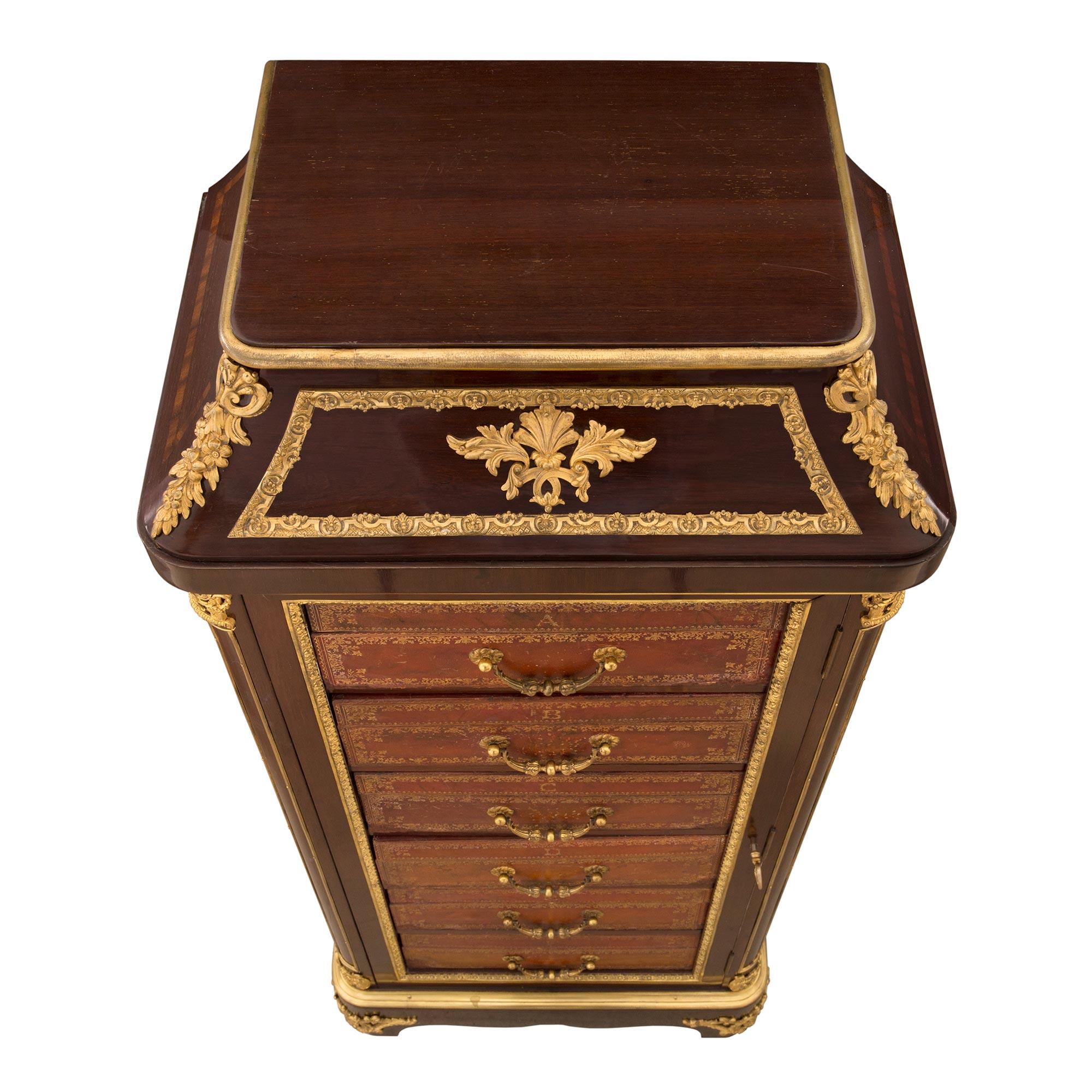 A sensational and high quality French 19th century Louis XVI st. mahogany, ormolu and leather cartonnier, signed 