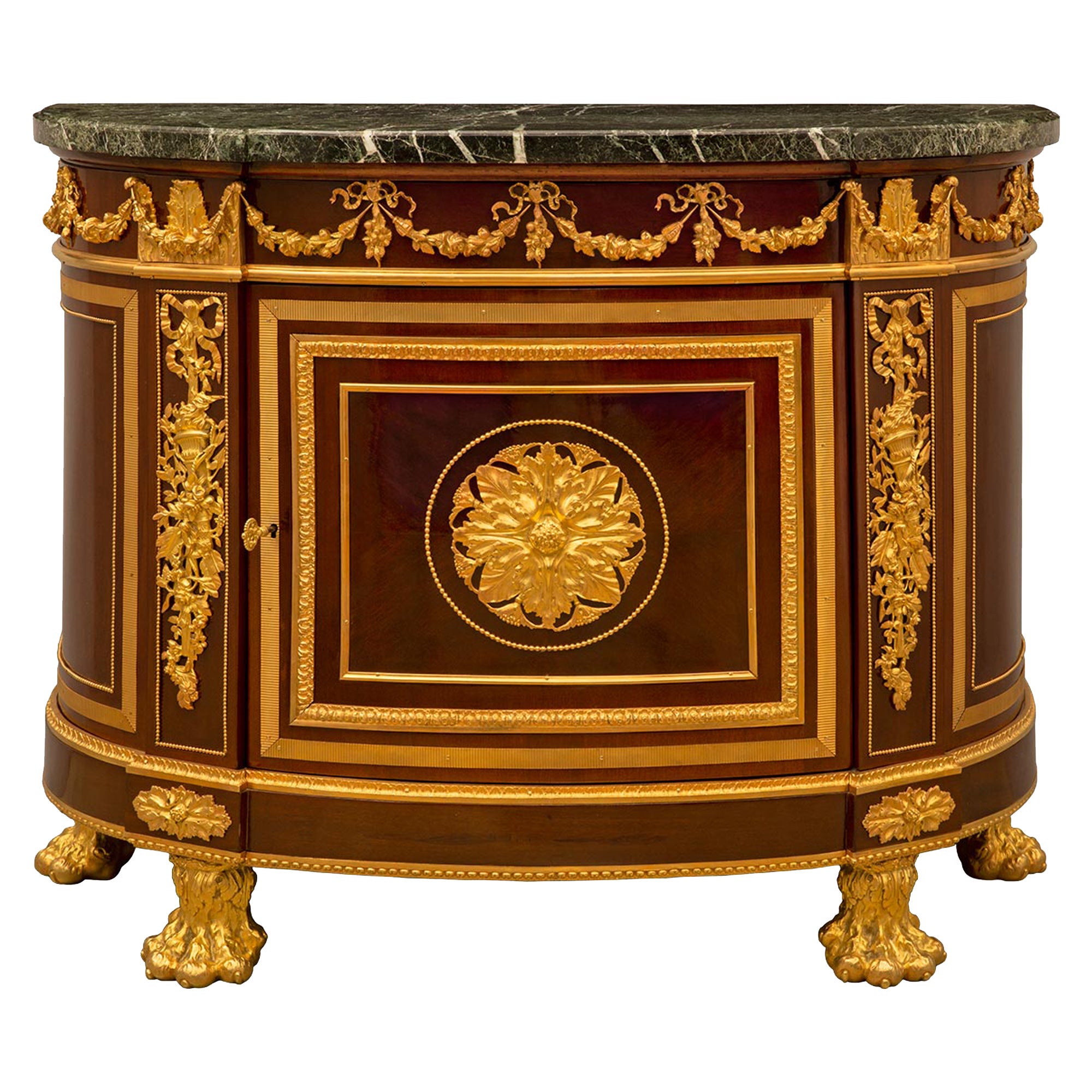 Commode à Porte de style Louis XVI du 19ème siècle en acajou et bronze doré.