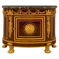 Commode à Porte de style Louis XVI du 19ème siècle en acajou et bronze doré.
