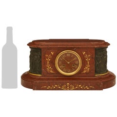 French 19th century Louis XVI st. Marble, patinated Bronze and Ormolu clock