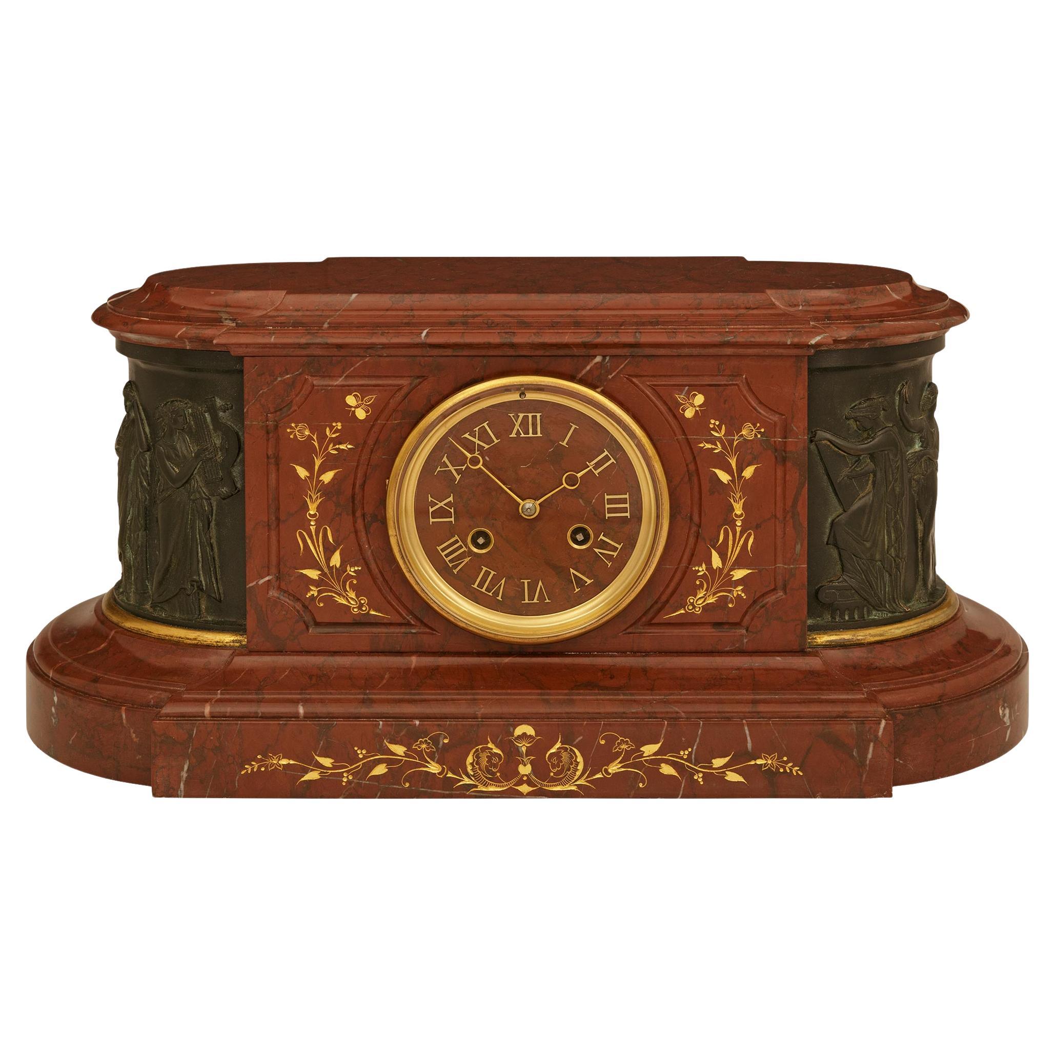 French 19th century Louis XVI st. Marble, patinated Bronze and Ormolu clock