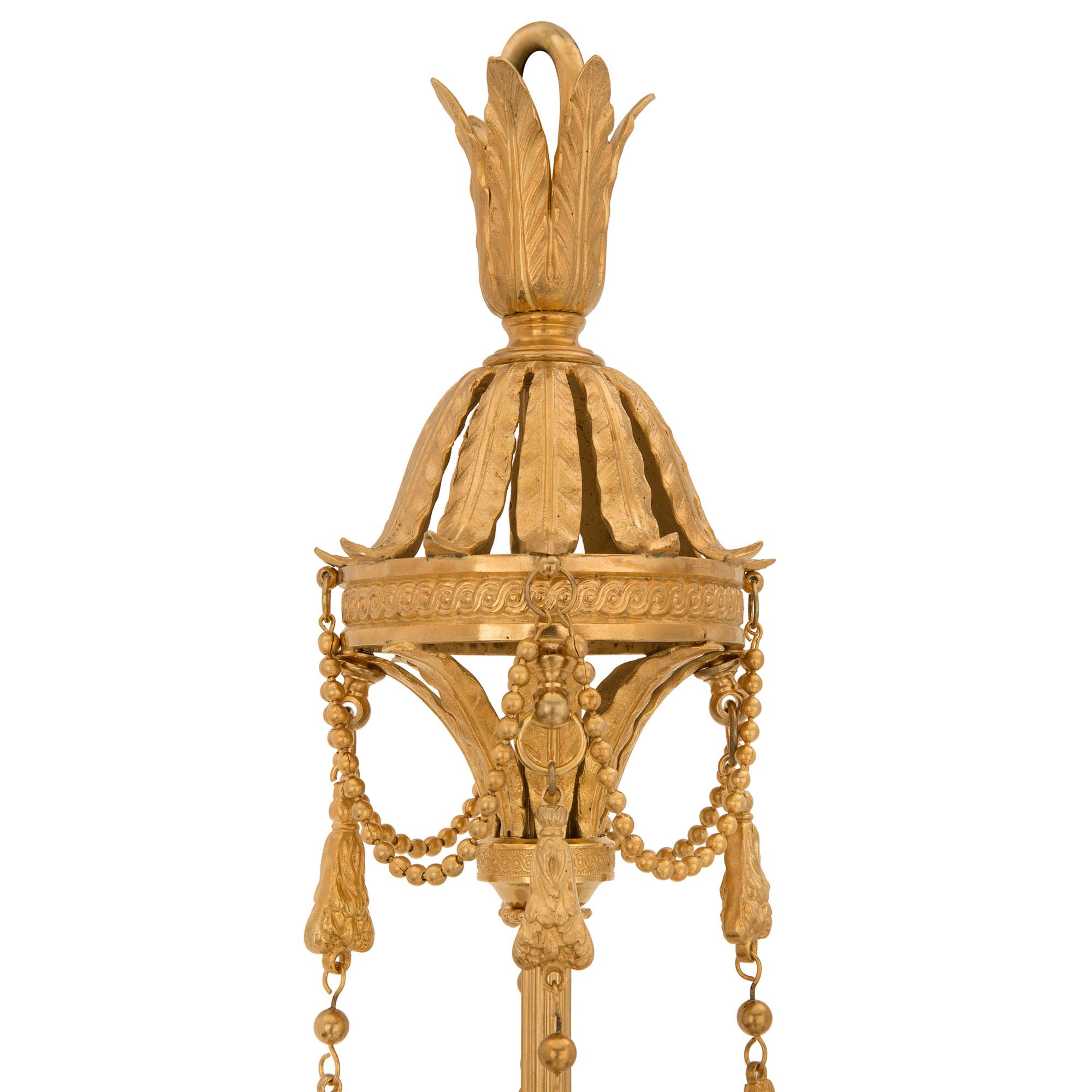 French 19th Century Louis XVI St. Ormolu and Frosted Glass Chandelier In Good Condition For Sale In West Palm Beach, FL